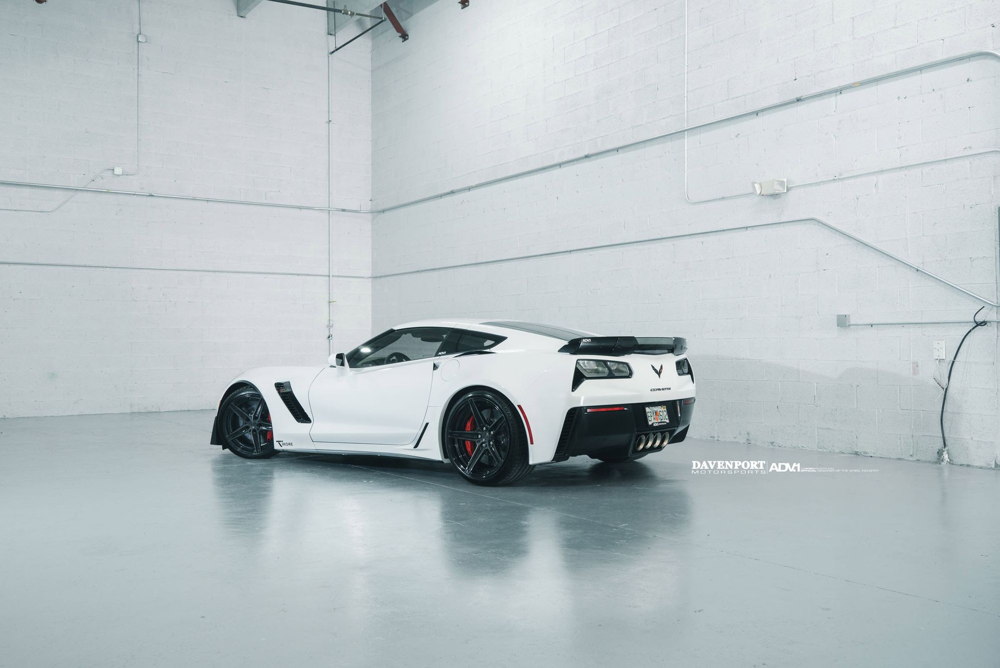 Custom Rear Diffuser on White Chevy Corvette - Photo by ADV.1