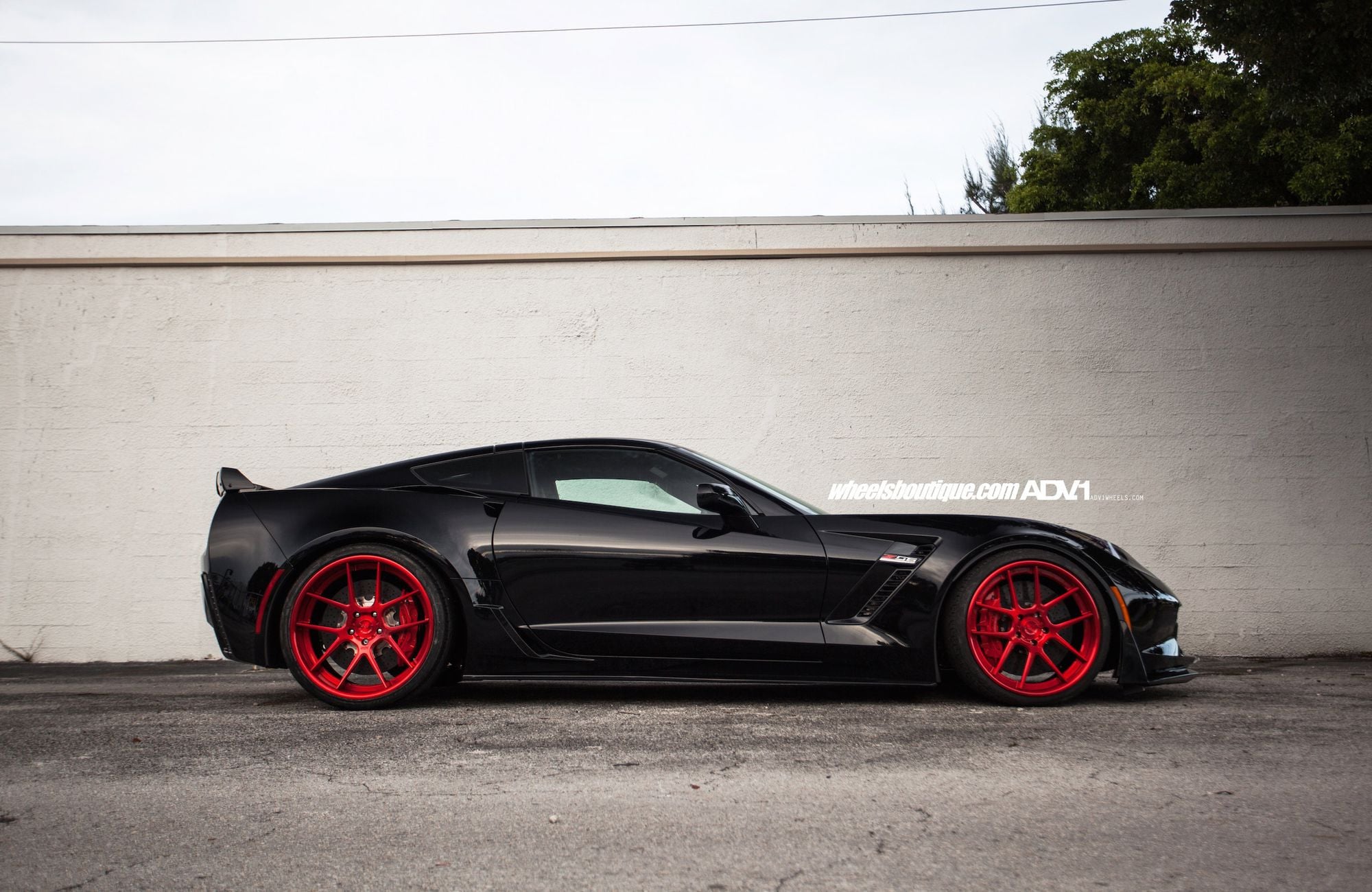 Black Chevy Corvette with Candy Red ADV1 Wheels - Photo by ADV.1