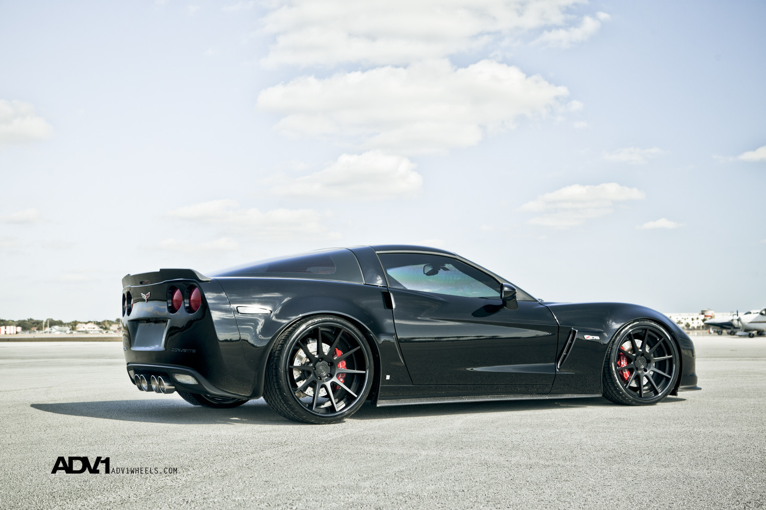 Rear Lip Spoiler on Stealth Black Chevy Corvette - Photo by ADV.1