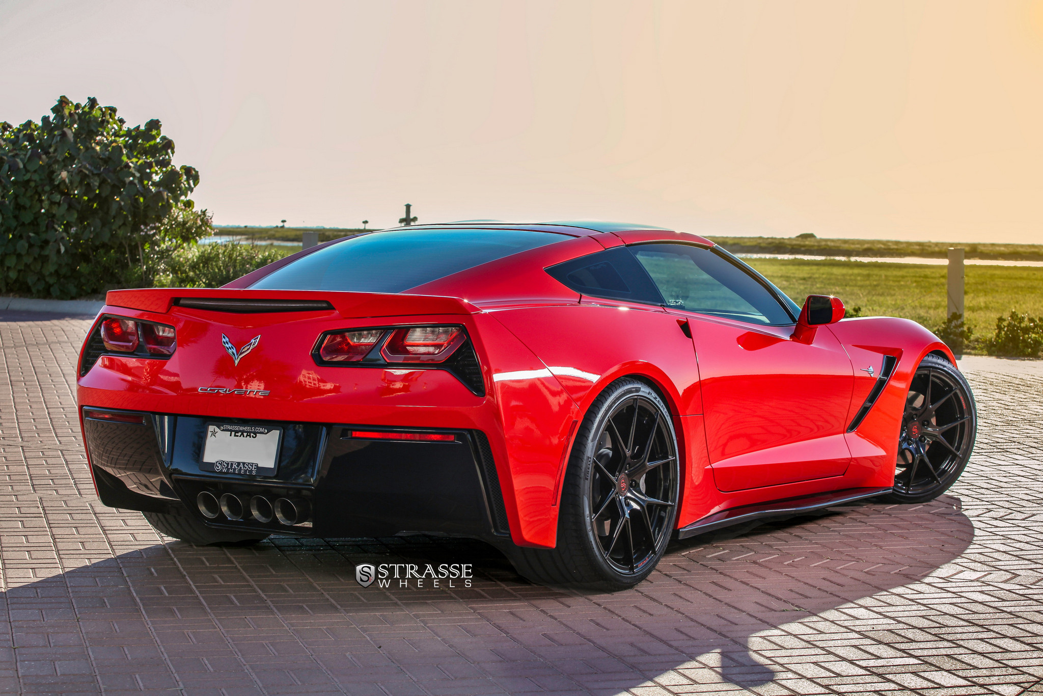 Red Chevy Corvette with Aftermarket Rear Spoiler - Photo by Strasse Forged