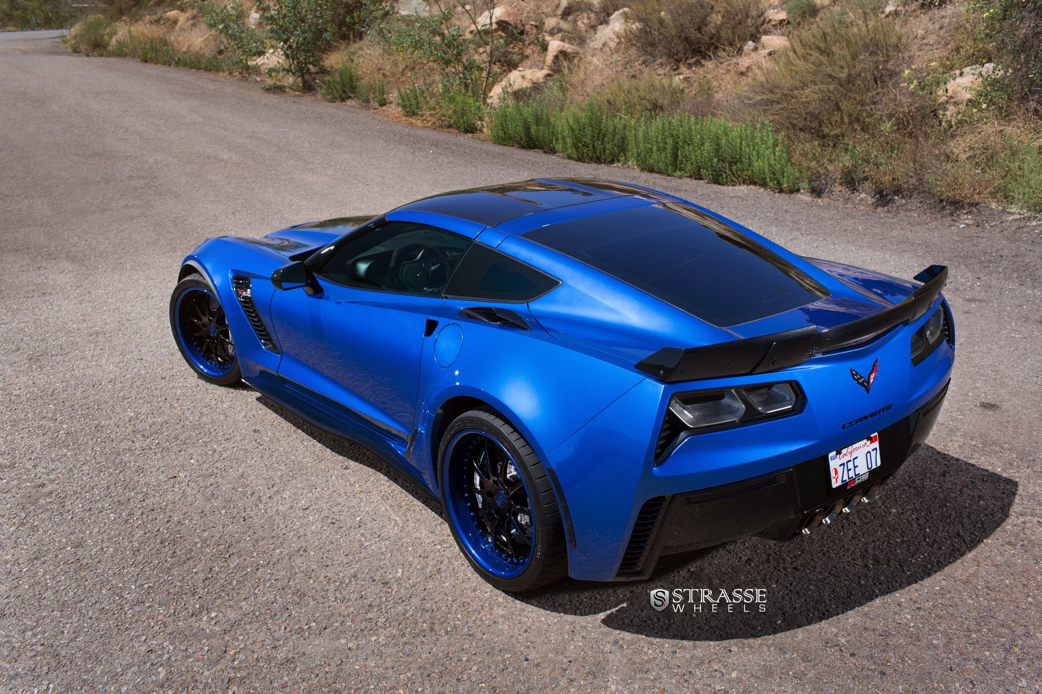 Blue Chevy Corvette with Large Rear Spoiler - Photo by Strasse Forged