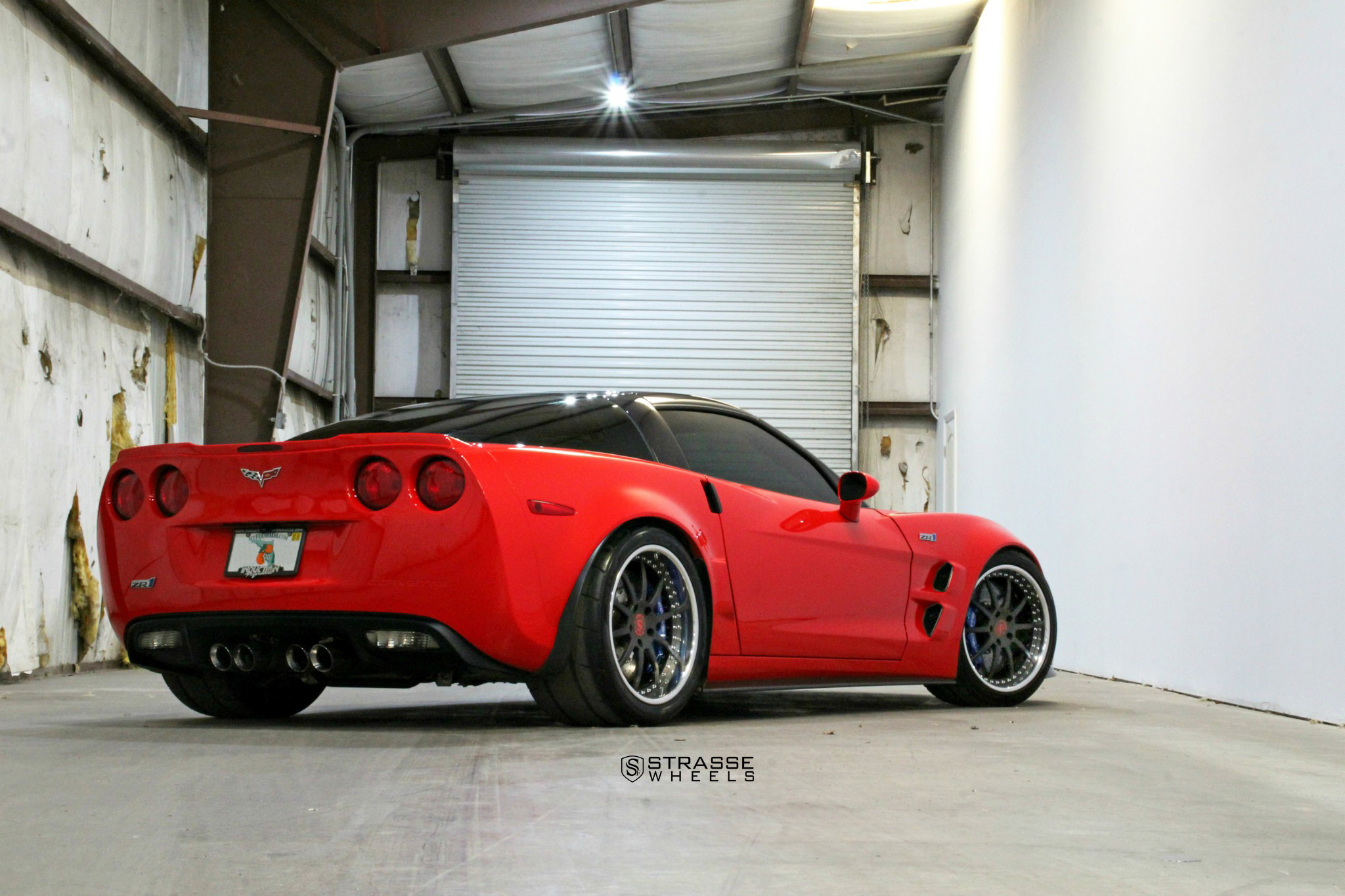 Rear Spoiler with Light on Red Chevy Corvette - Photo by Strasse Forged