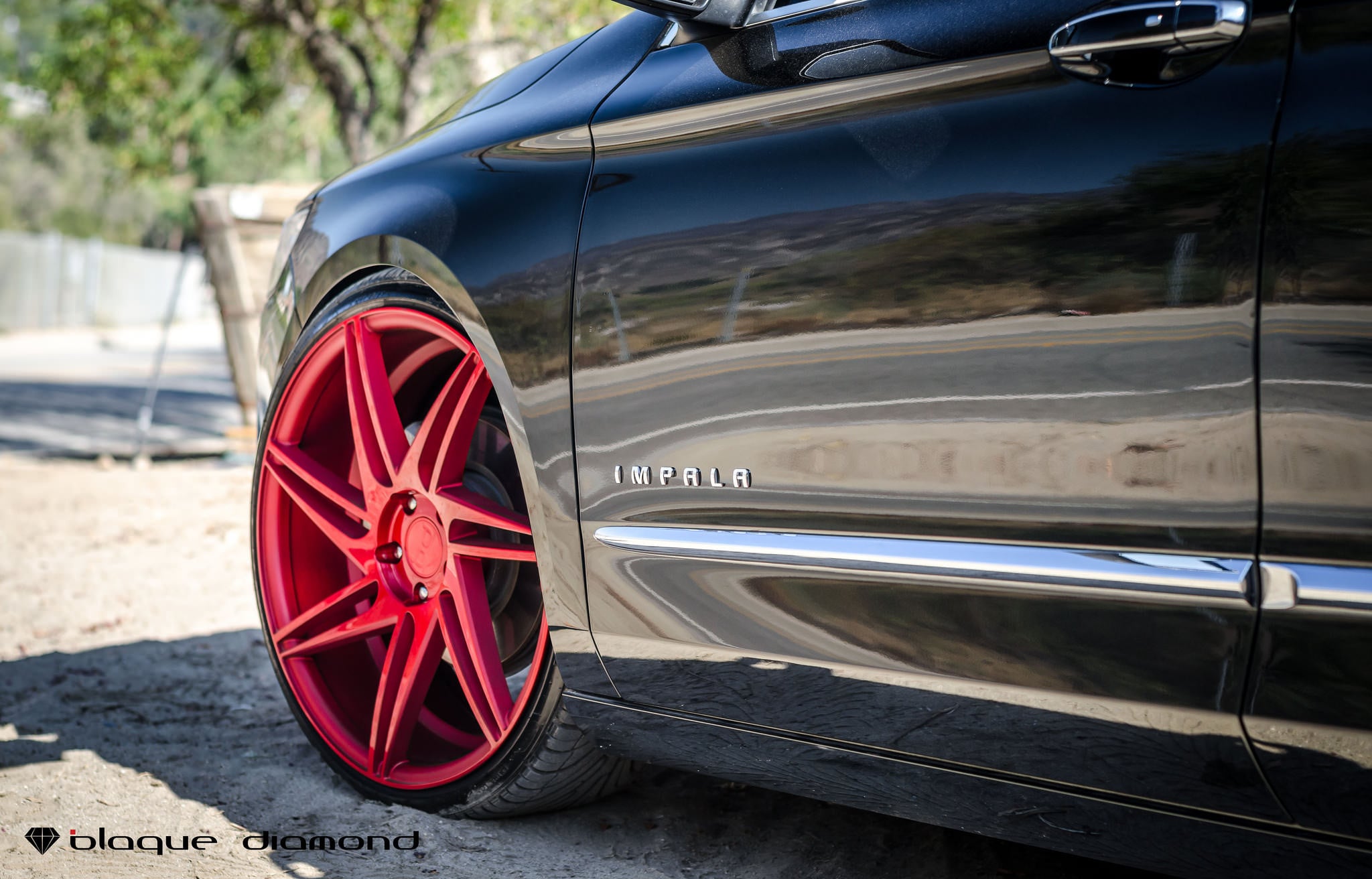 Red Black Diamond Rims on Chevy Impala - Photo by Black Diamond