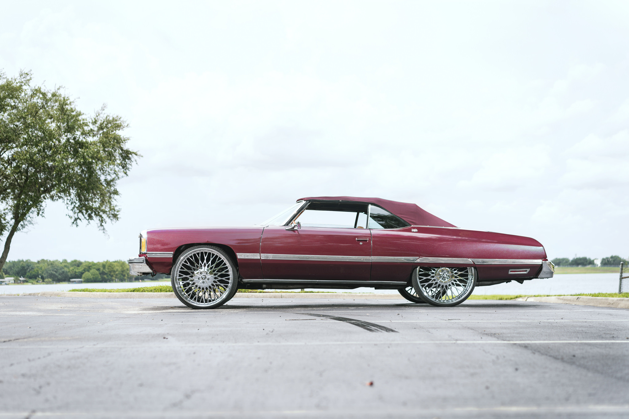 Lifted Chevy Impala on Custom Polished DUB Rims - Photo by DUB