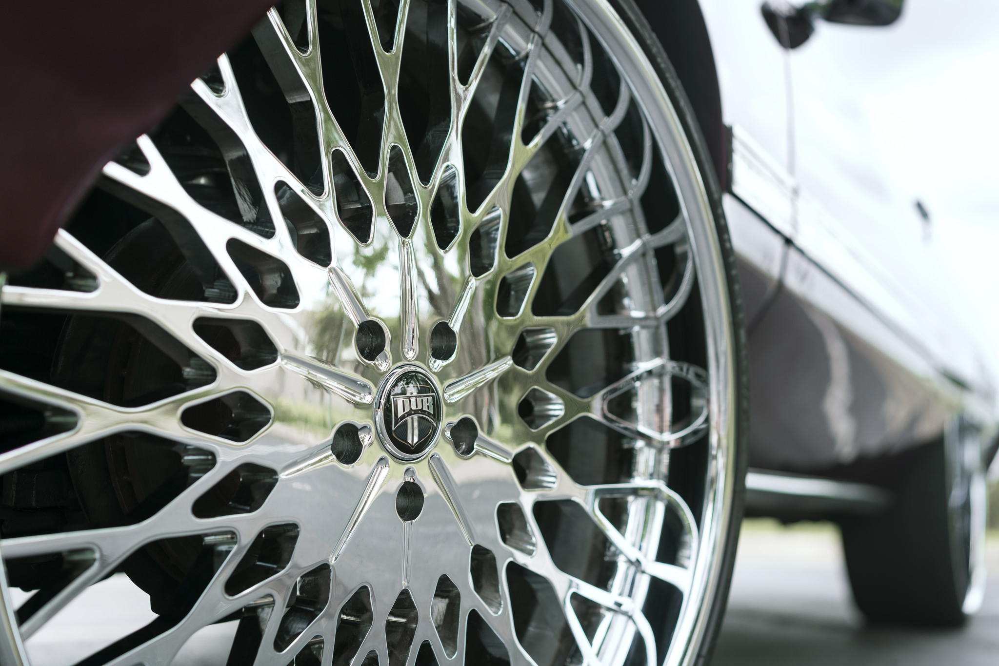 28 Inch DUB Wheels on Lifted Chevy Impala - Photo by DUB