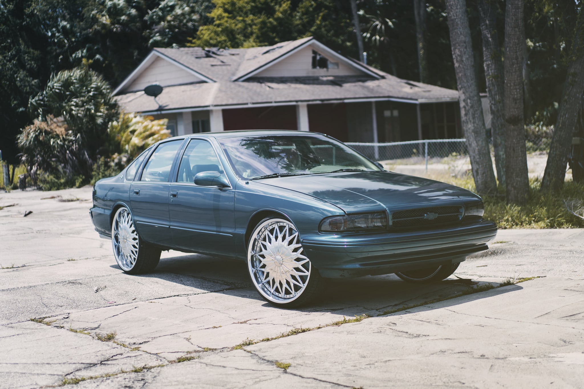 Custom Joker DUB Rims on Blue Chevy Impala - Photo by DUB