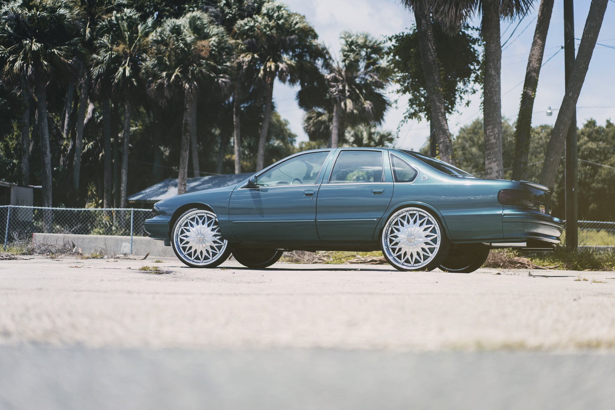 26 Inch Chrome DUB Wheels on Blue Chevy Impala - Photo by DUB
