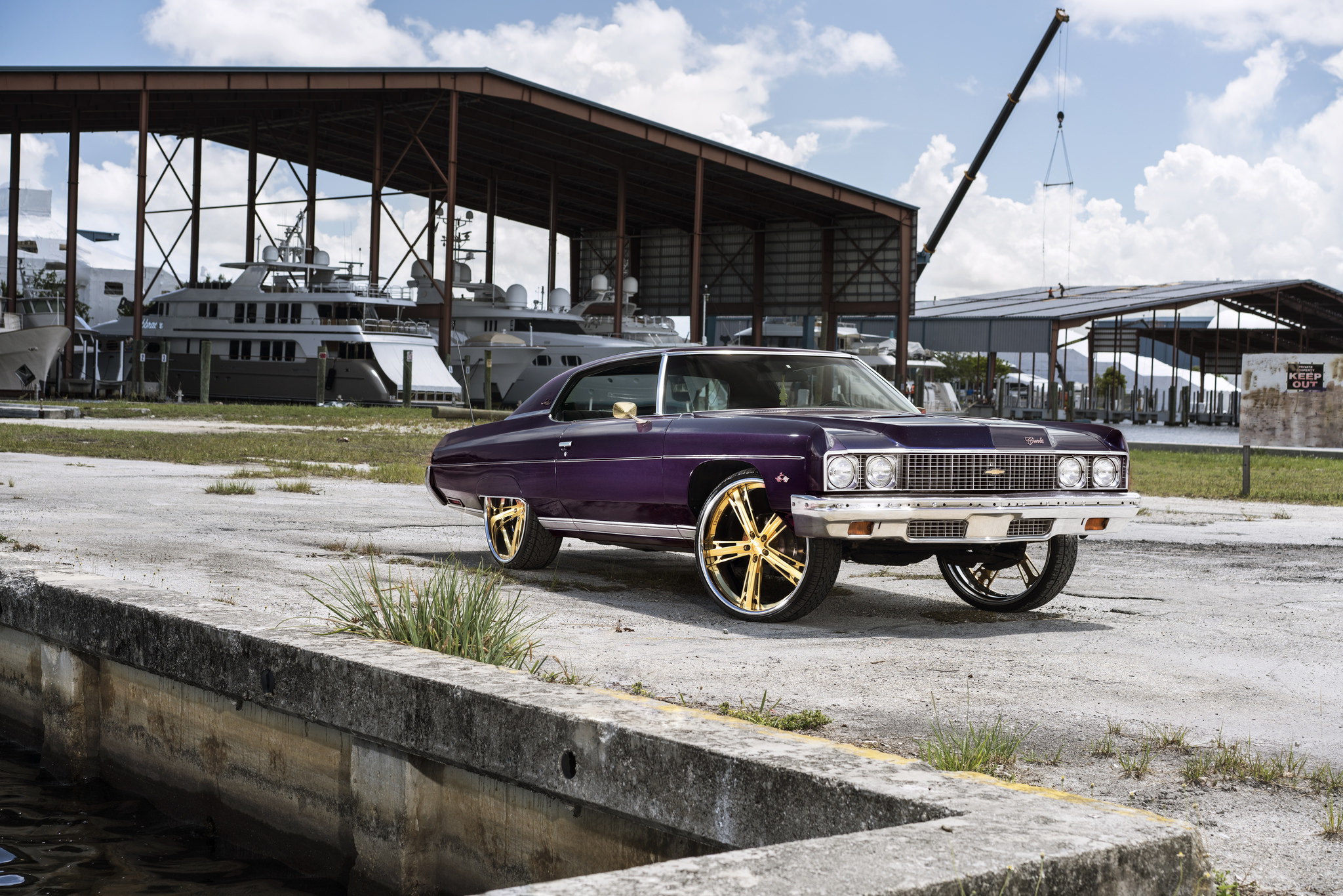Eggplant Purple Chevy Impala Donk on Gold Wheels | CARiD.com Gallery