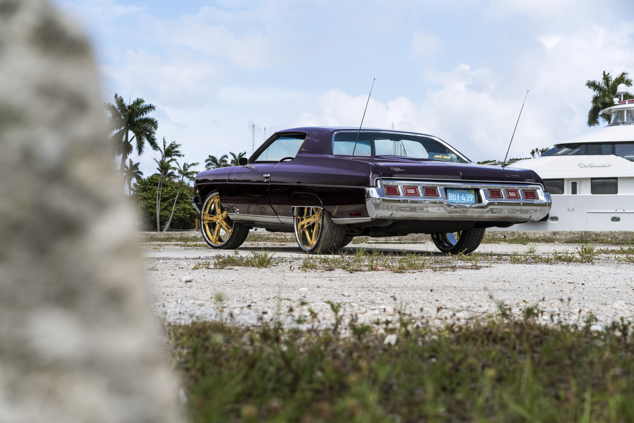 Lifted Chevy Impala with Aftermarket Chrome Rear Bumper Cover - Photo by DUB