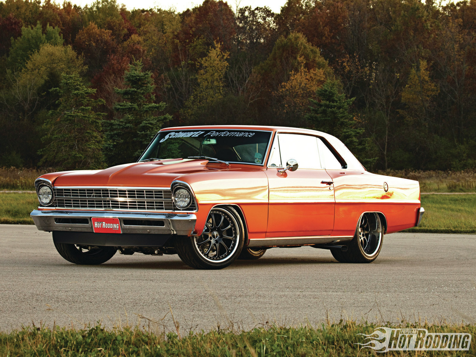 Custom Orange Chevy Chevy II with Chrome Side Skirts - Photo by Forgeline Motorsports