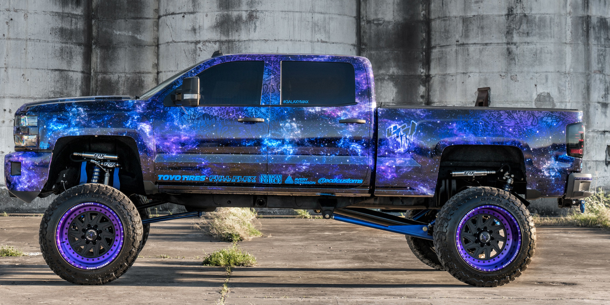 Black American Force Rims With Purple Lips on Lifted Silverado - Photo by Dale Martin