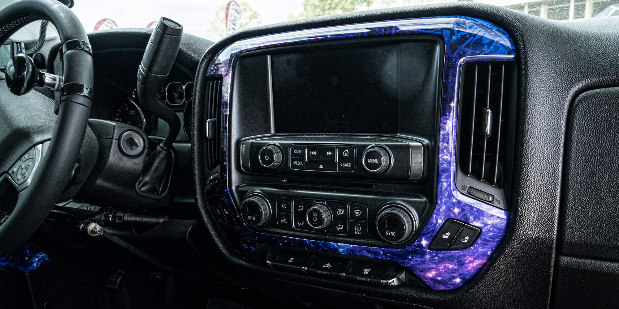 Gallaxy Vinyl Wrap on Lifted Silverado 2500 HD - Photo by Dale Martin