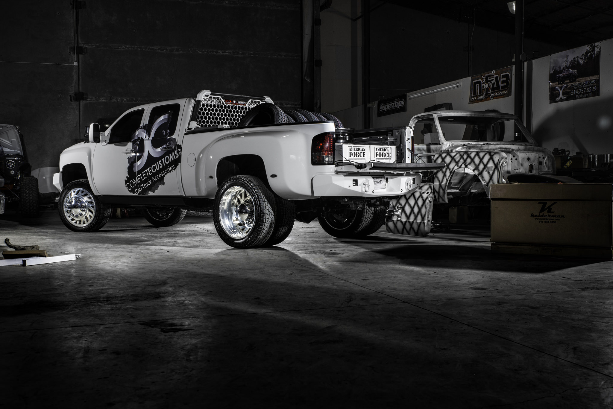 White Chevy Silverado Dually With Custom Wheels - Photo by American Force