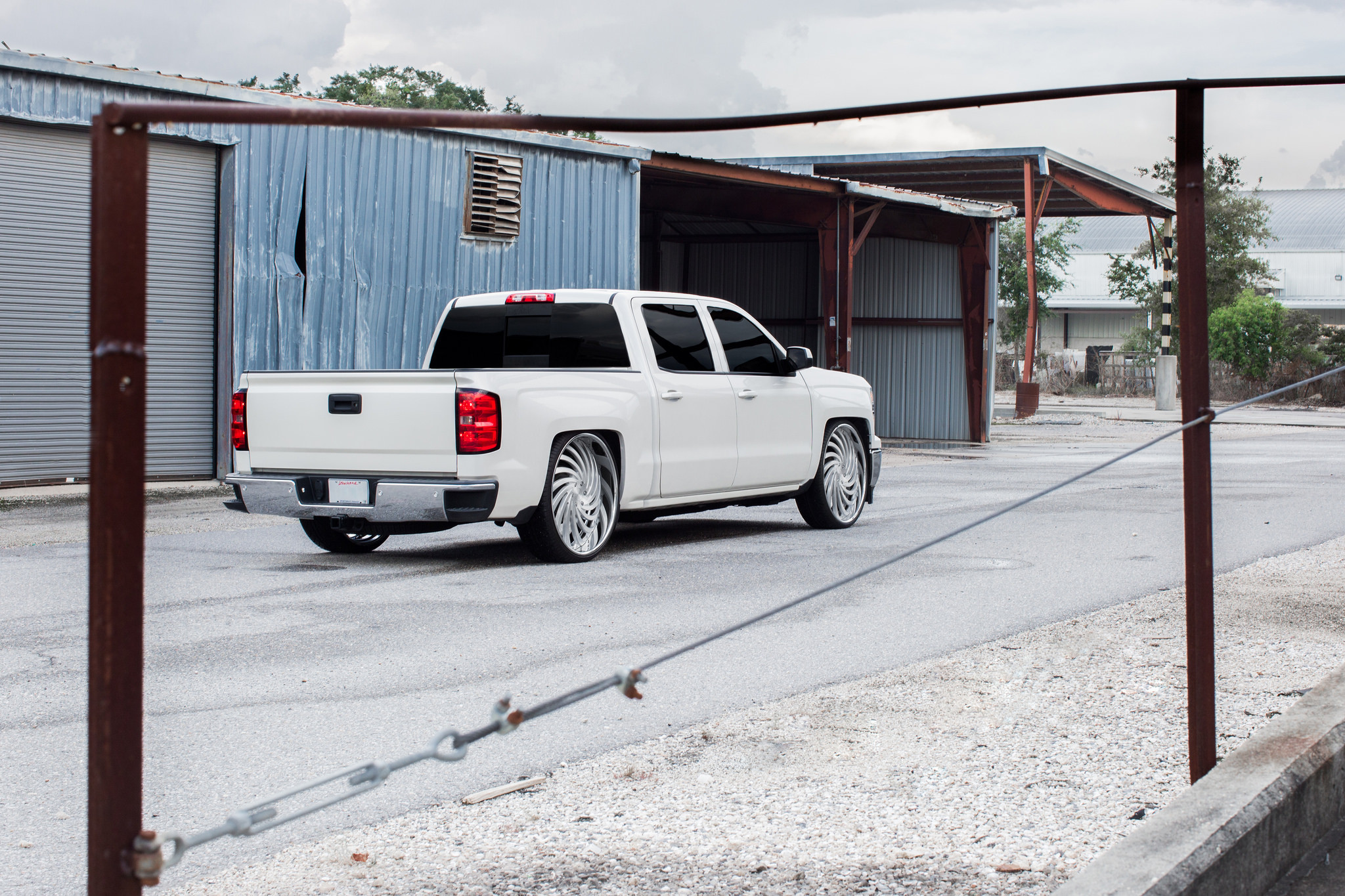 Chrome DUB Wheels on White Chevy Silverado - Photo by Dub Wheels