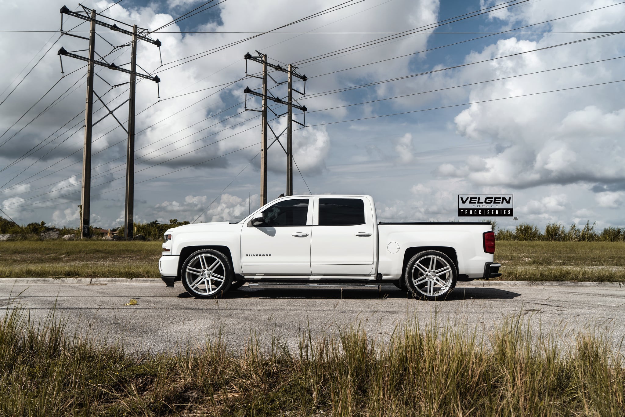 White Chevy Silverado with Aftermarket Running Boards - Photo by Velgen Wheels