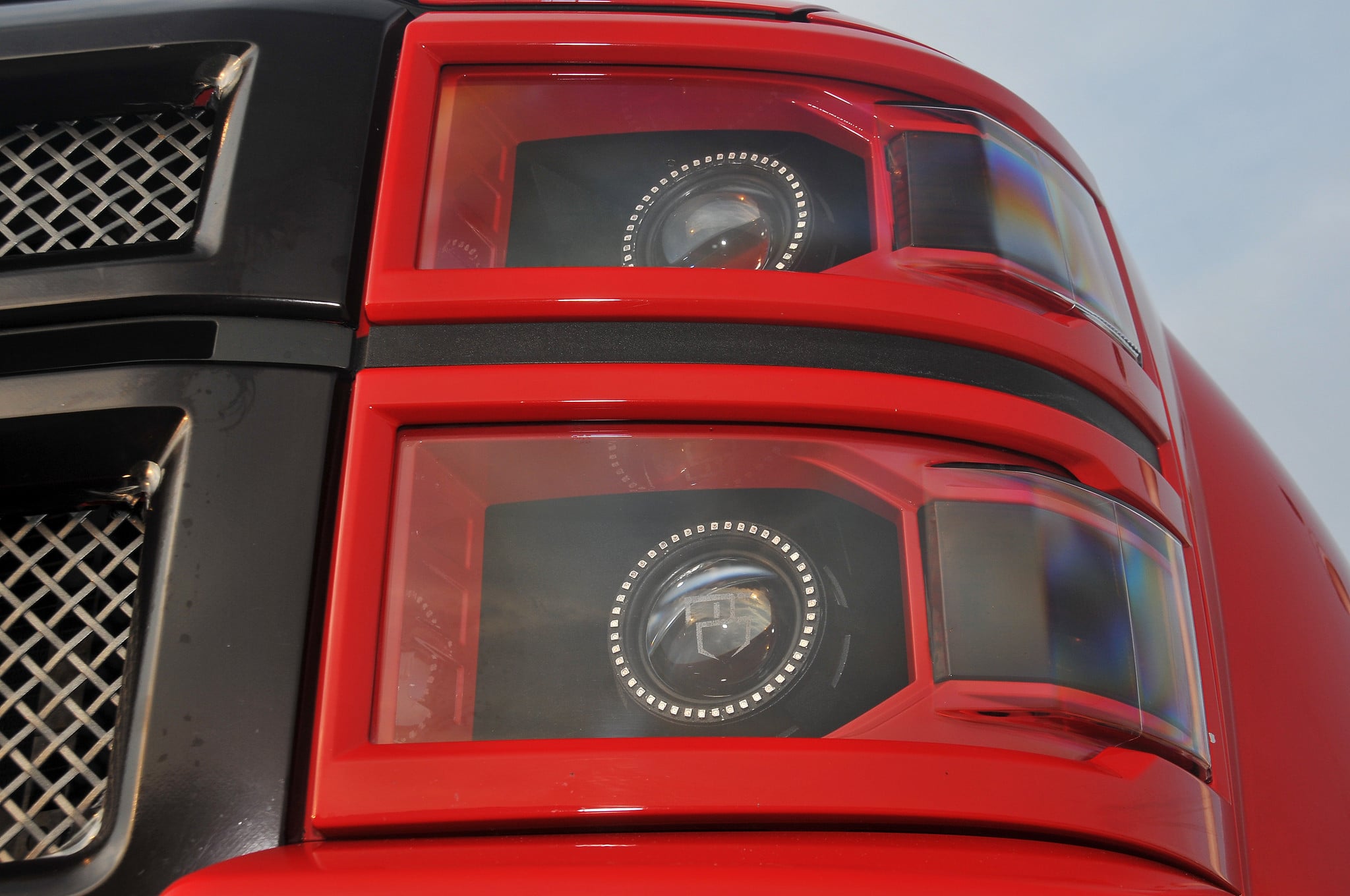 Red Lifted Silverado 2500HD Show Truck - Photo by American Force
