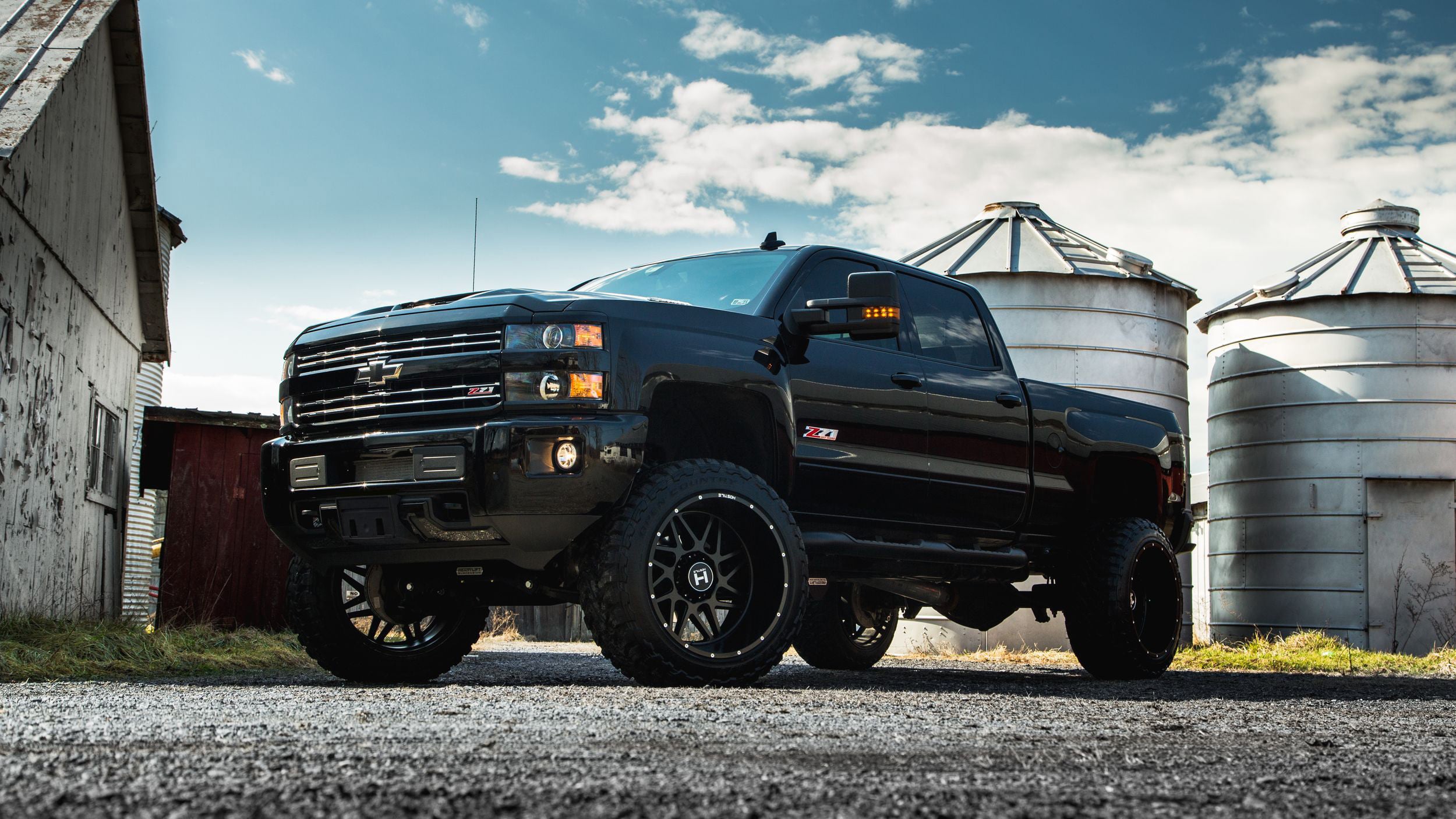 Dark Smoke Projector Headlights on Black Lifted Chevy Silverado - Photo by CARiD