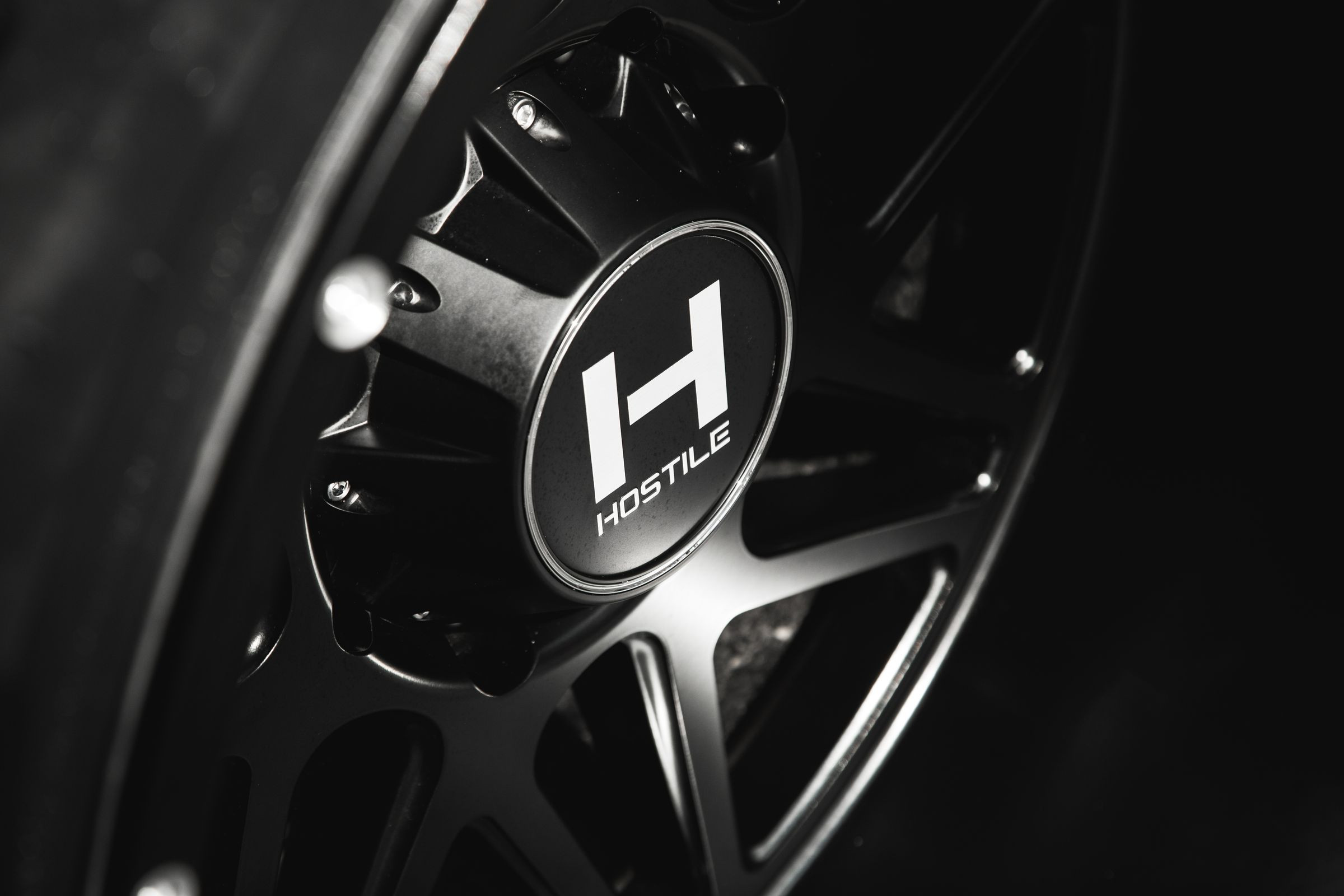 Hostile Rims on Black Lifted Chevy Silverado ZL1 - Photo by CARiD