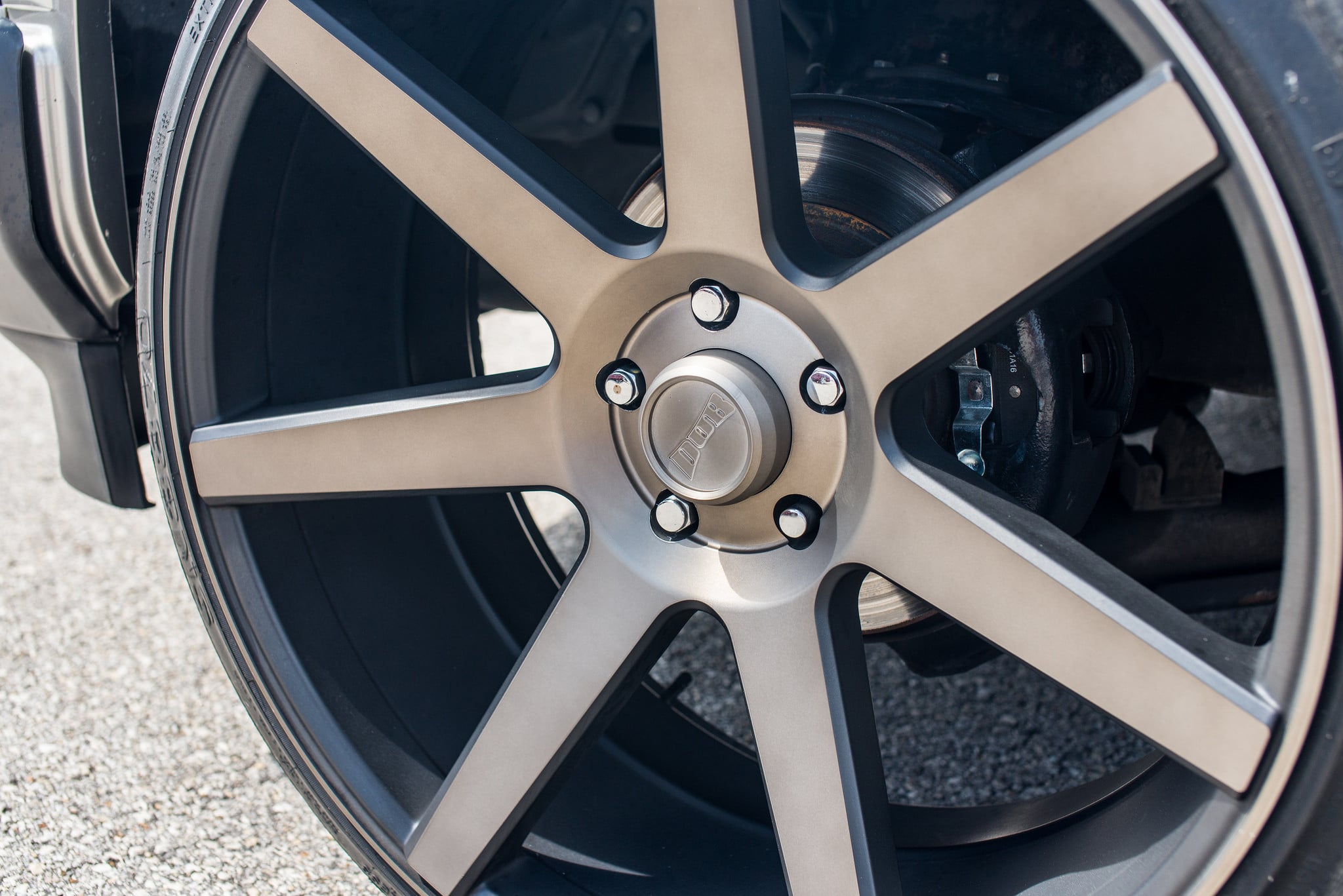 Custom 22 Inch DUB Rims with Dark Tint on Chevy Tahoe - Photo by DUB