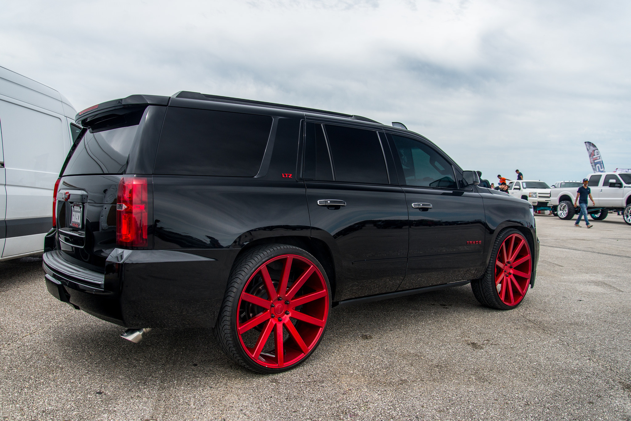 Chevy Tahoe LTZ with Custom Red DUB Rims - Photo by DUB