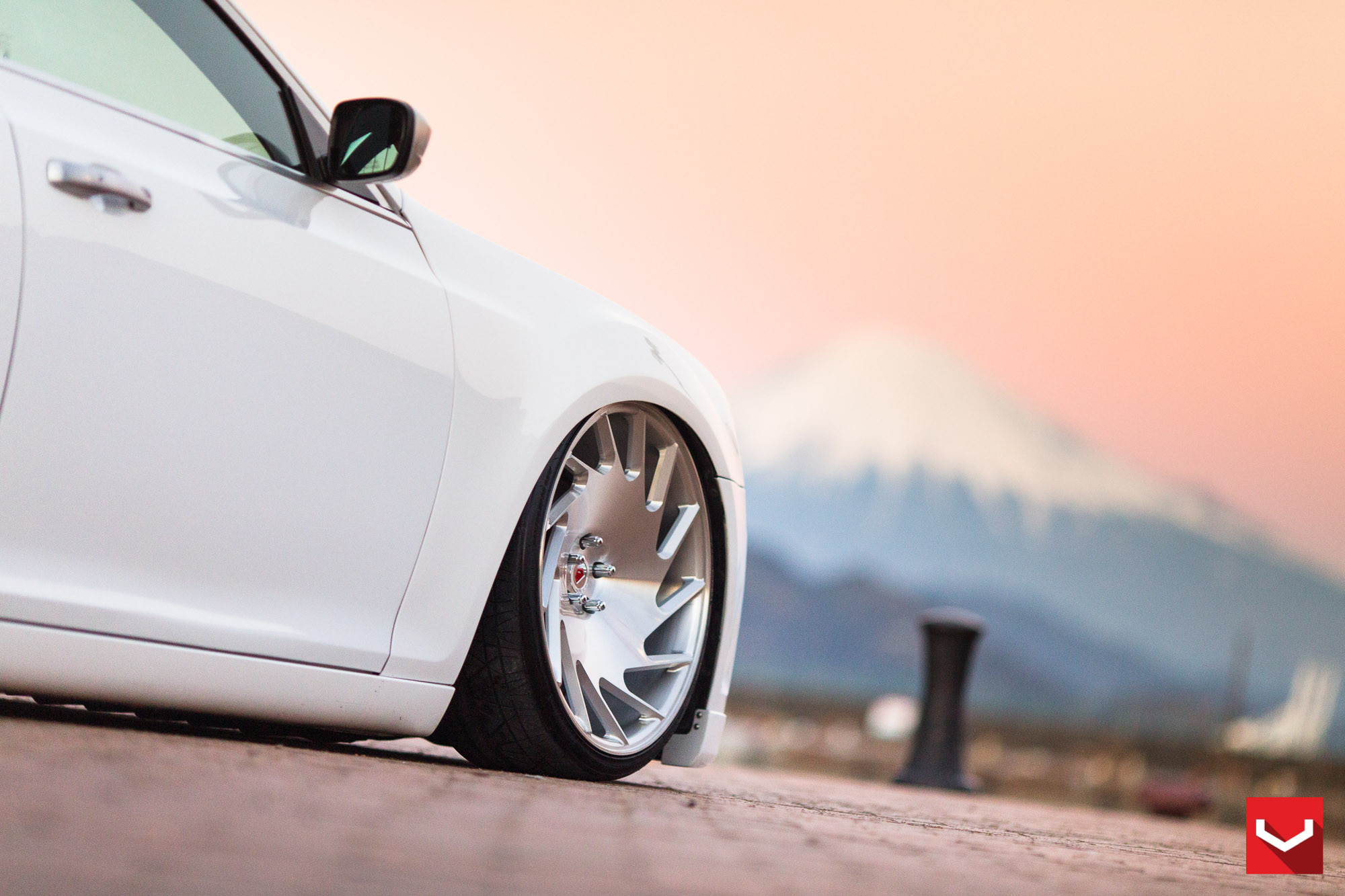 Lowered White Chrysler 300 with Forged Chrome Vossen Wheels - Photo by Vossen