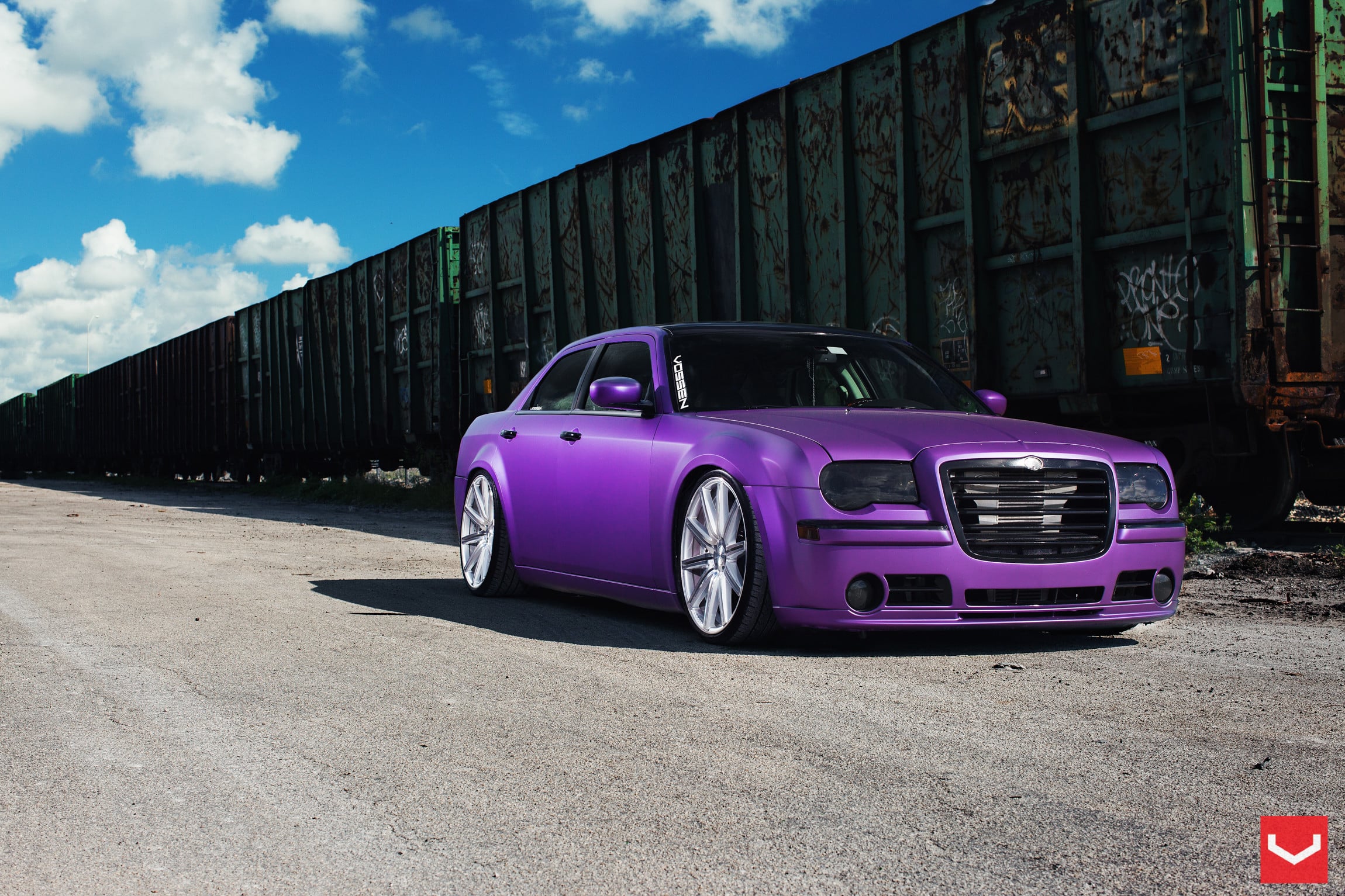 Custom Purple Matte Chrysler 300 with Blacked Out Grille - Photo by Vossen