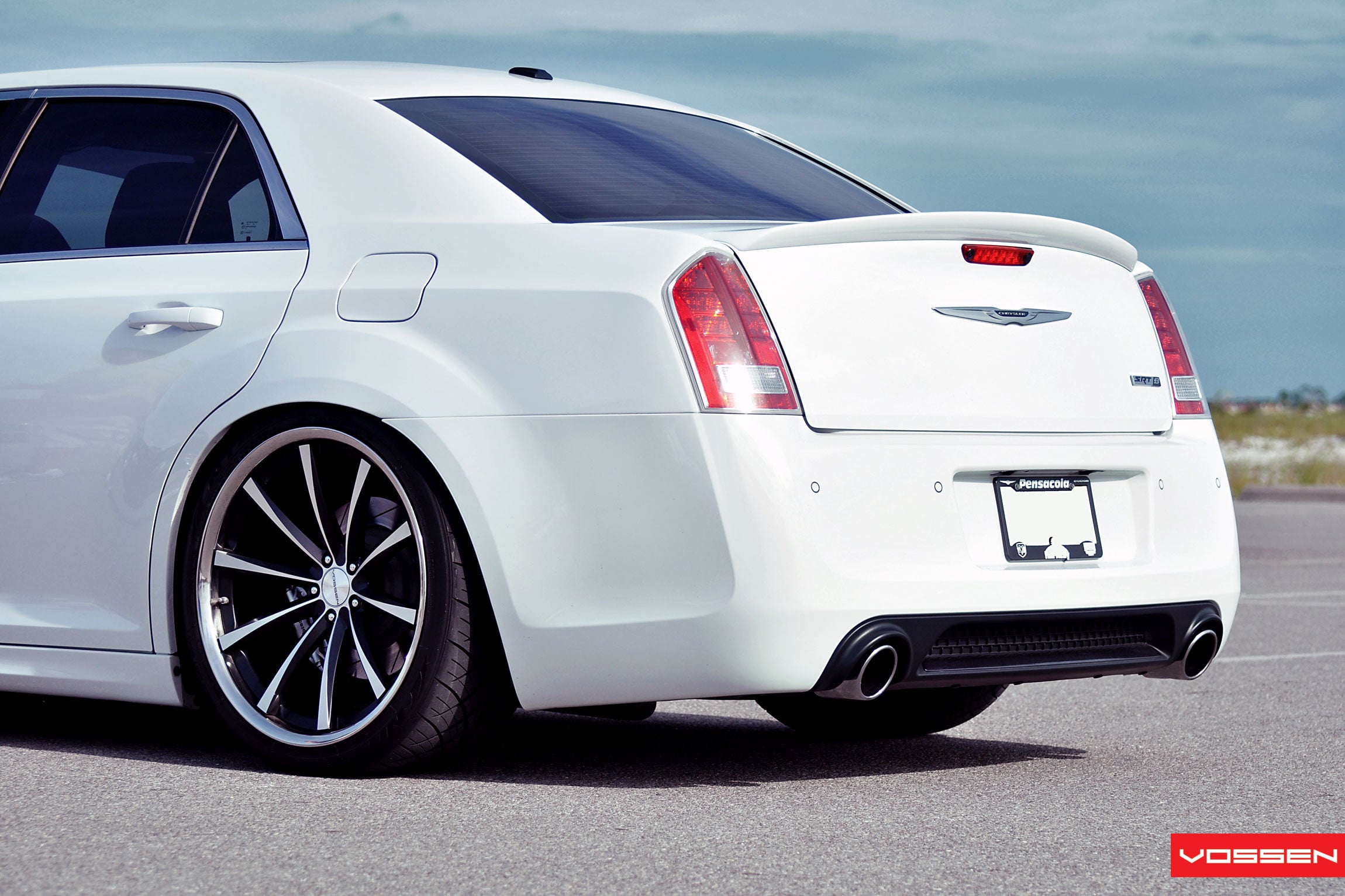 Red LED Taillights with Tail Light Guards on Chrysler 300 - Photo by Vossen