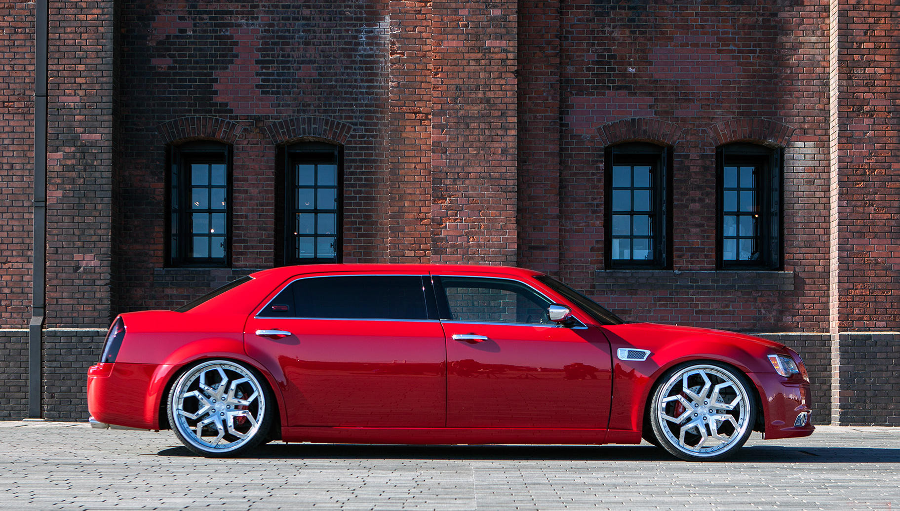 Red Chrysler 300 with Custom Chrome Trim - Photo by Lexani