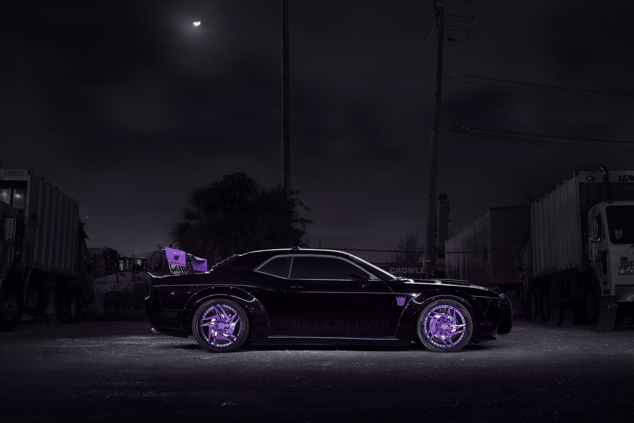 Lowered Black Dodge Challenger with Fender Flares - Photo by DUB