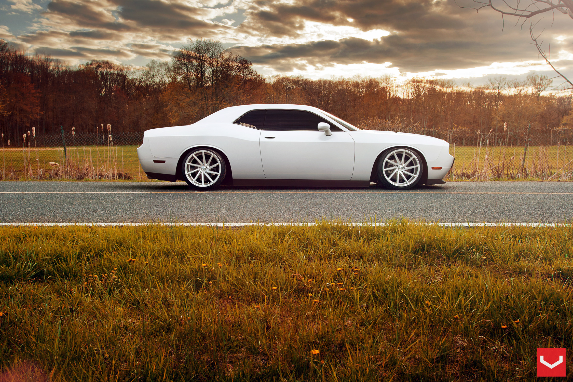 White Dodge Challenger with Aftermarket Side Skirts - Photo by Vossen