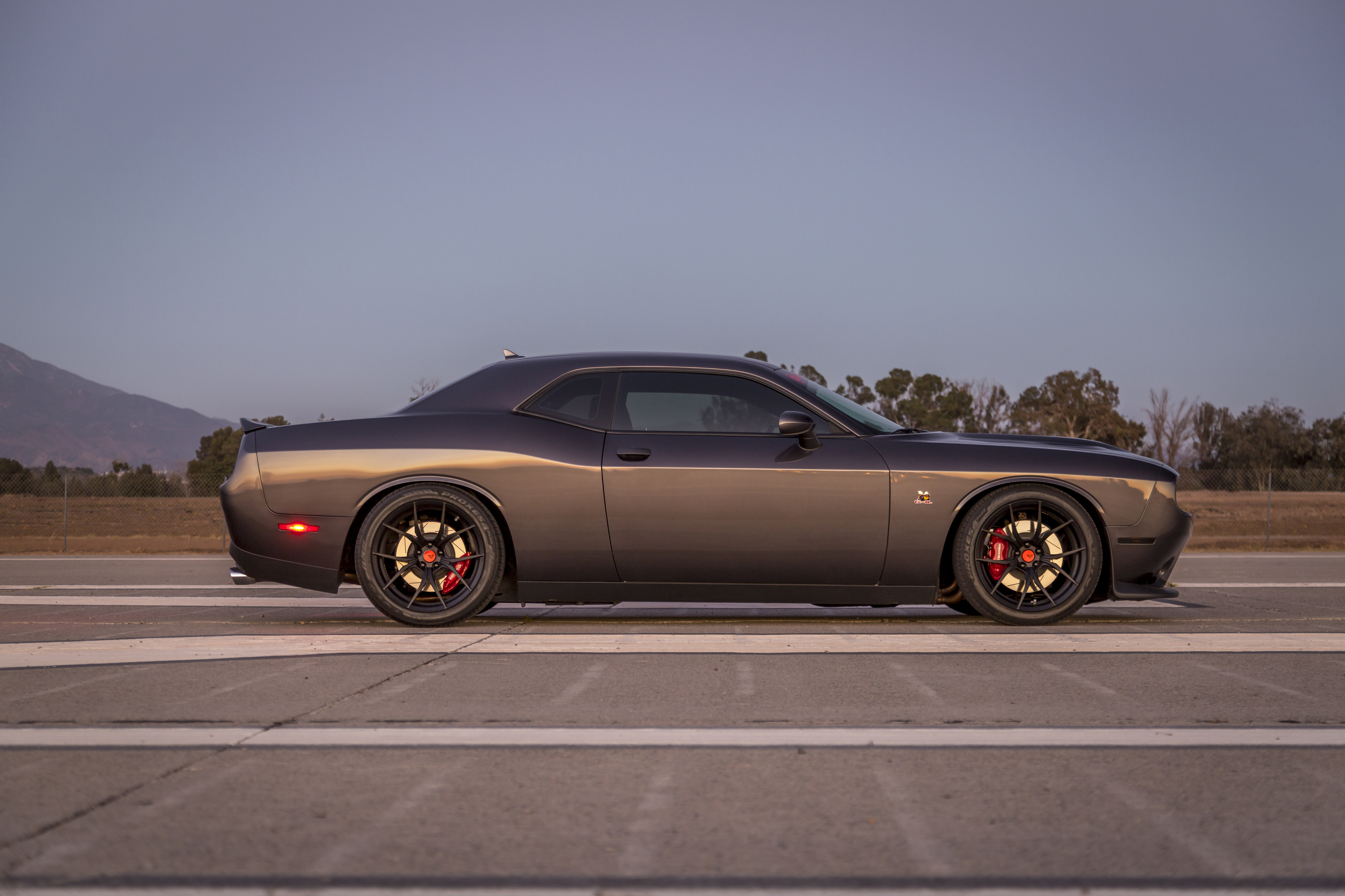 Aftermarket Side Skirts on Gray Dodge Challenger - Photo by Vorstiner