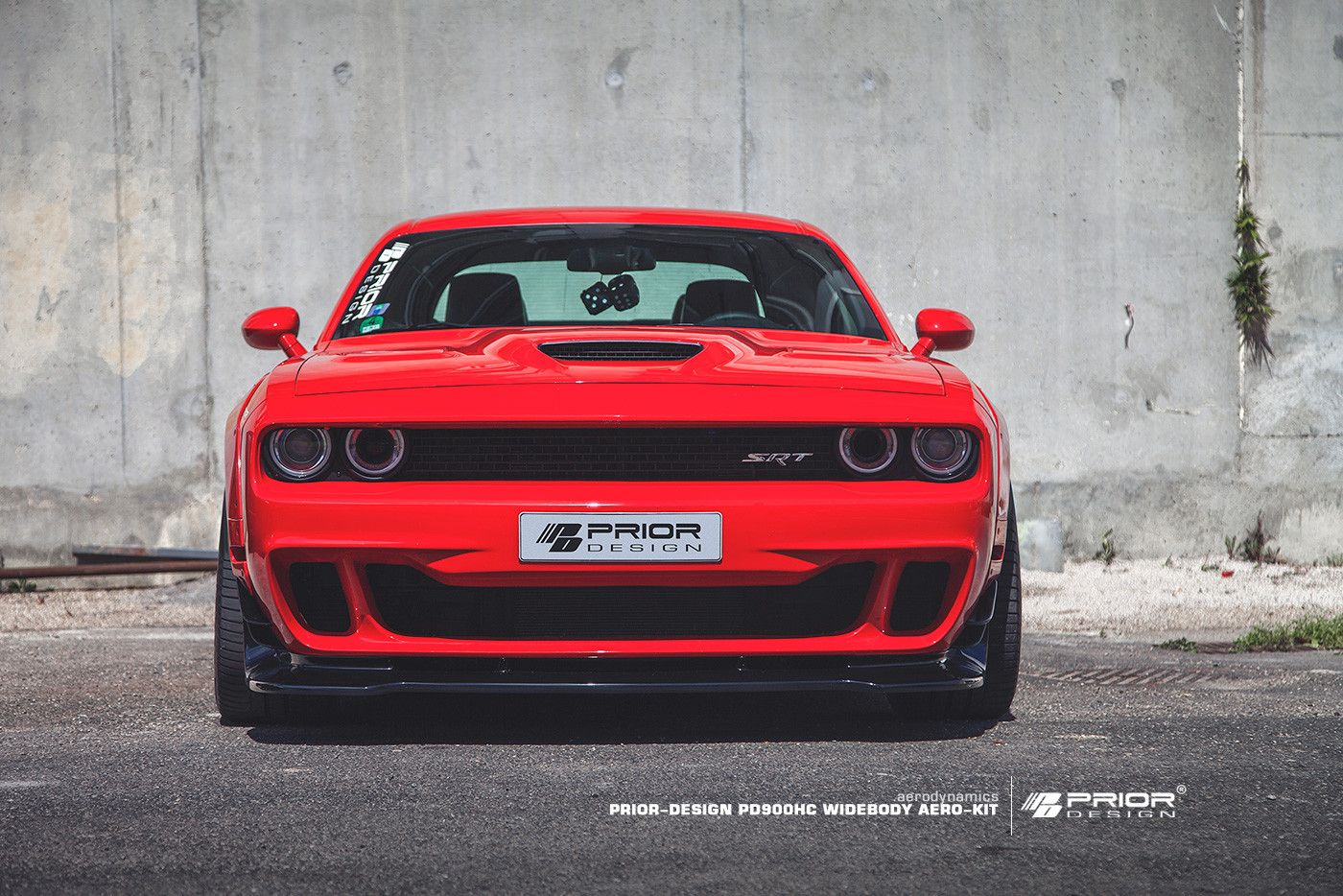 Aftermarket Vented Hood on Red Dodge Challenger SRT - Photo by Prior Design