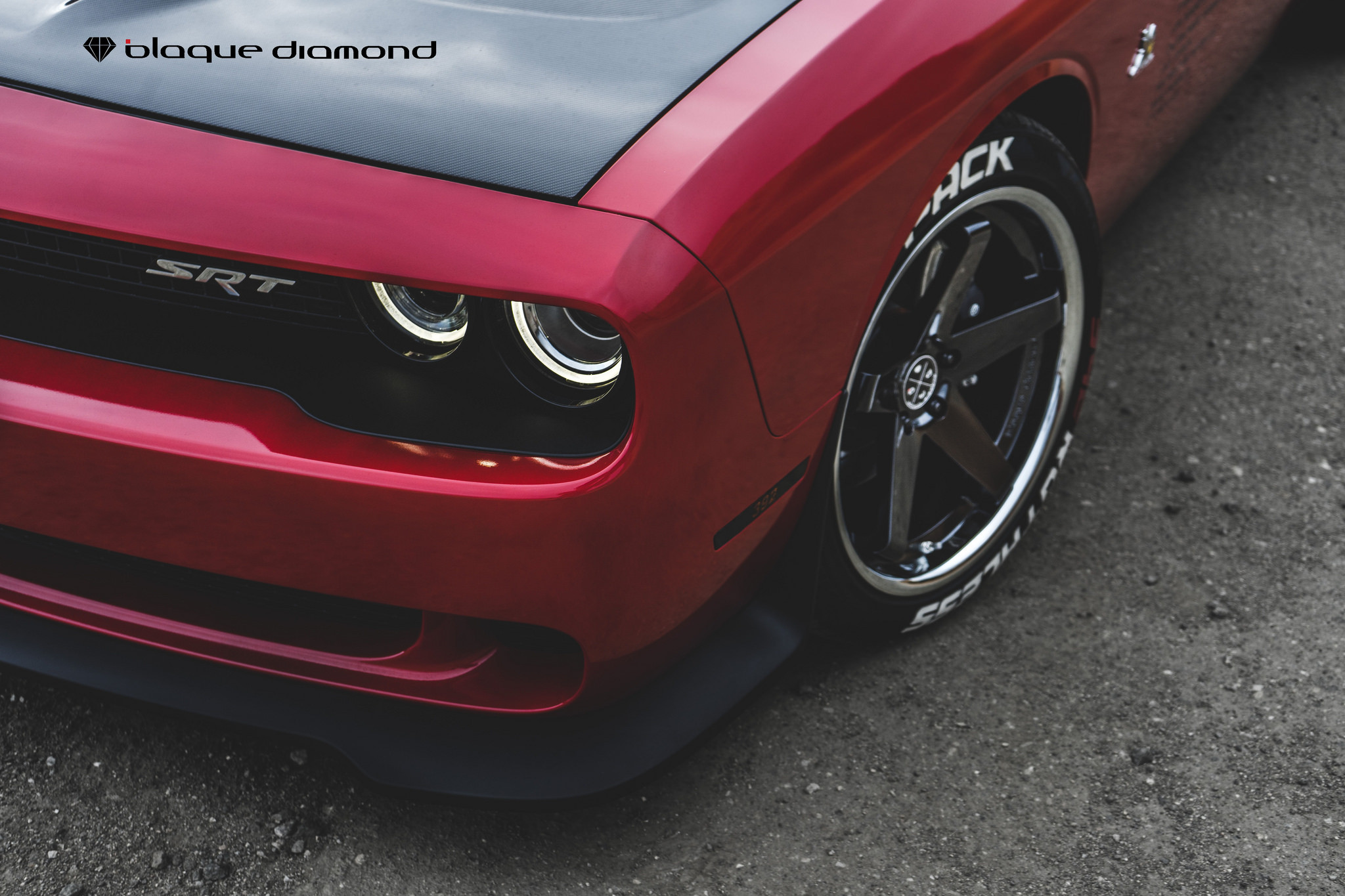 Aftermarket Halo Headlights on Red Dodge Challenger - Photo by Blaque Diamond