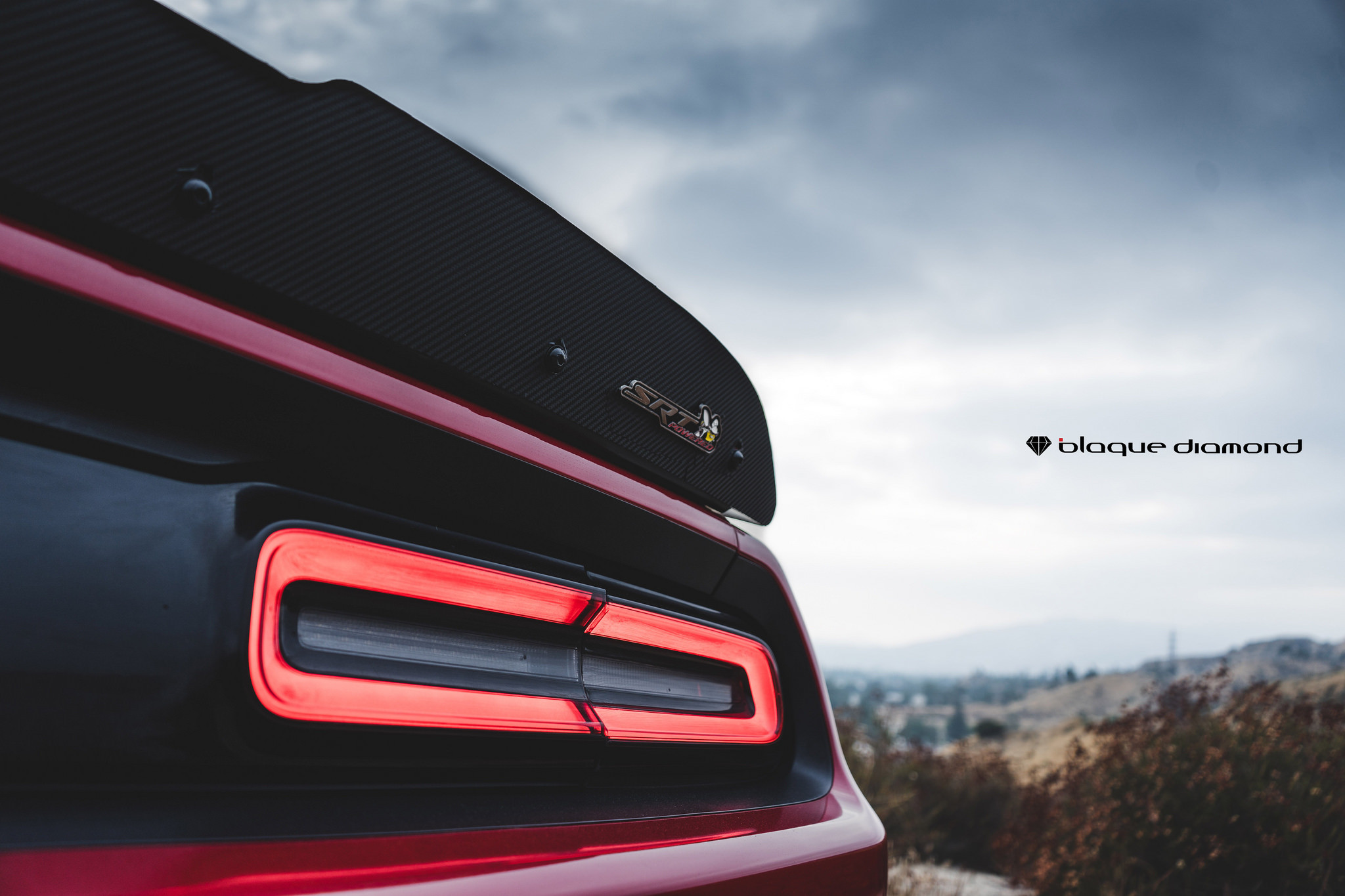 Carbon Fiber Rear Spoiler on Red Dodge Challenger - Photo by Blaque Diamond