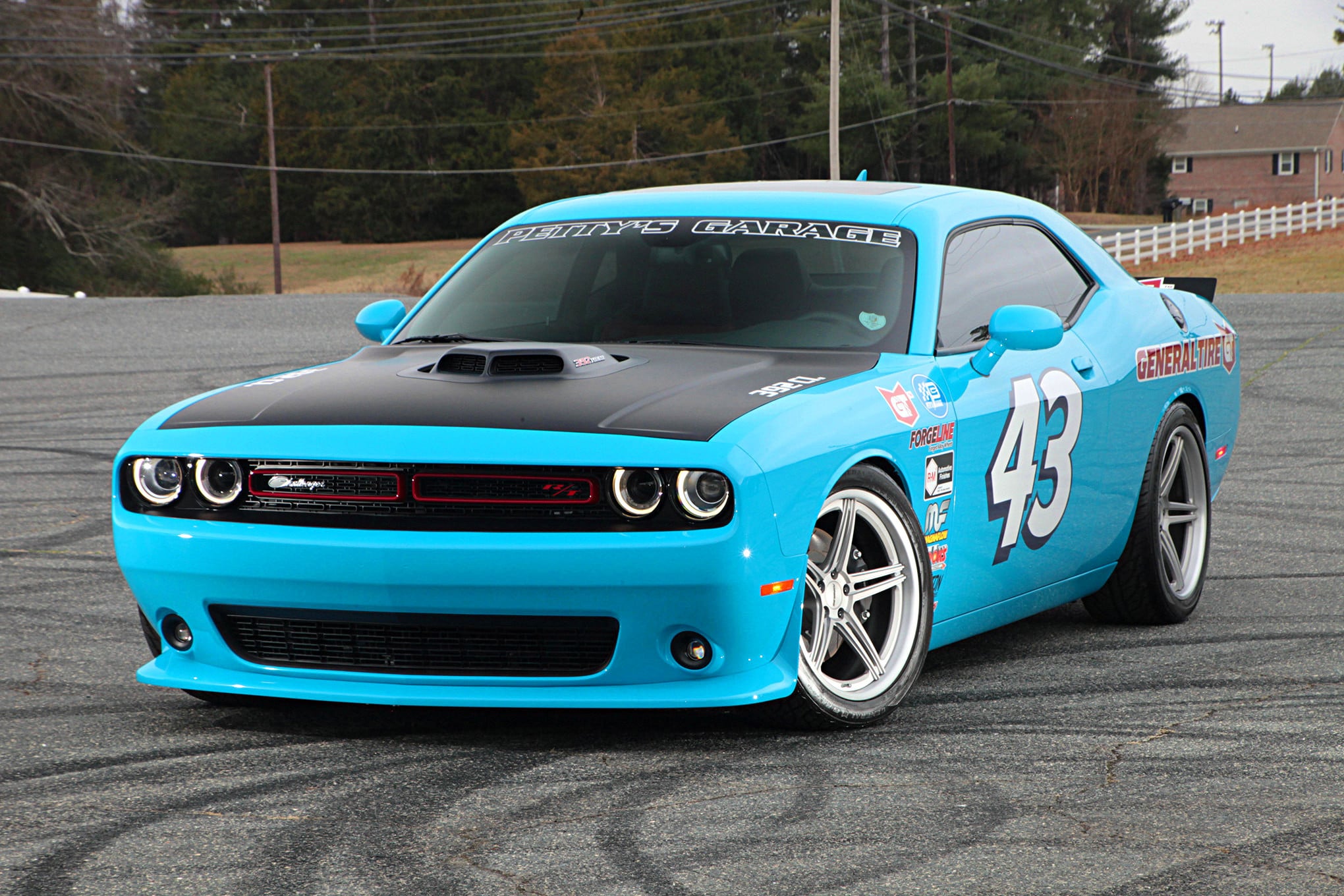Blue Debadged Dodge Challenger with Custom Halo Headlights - Photo by Forgeline Motorsports