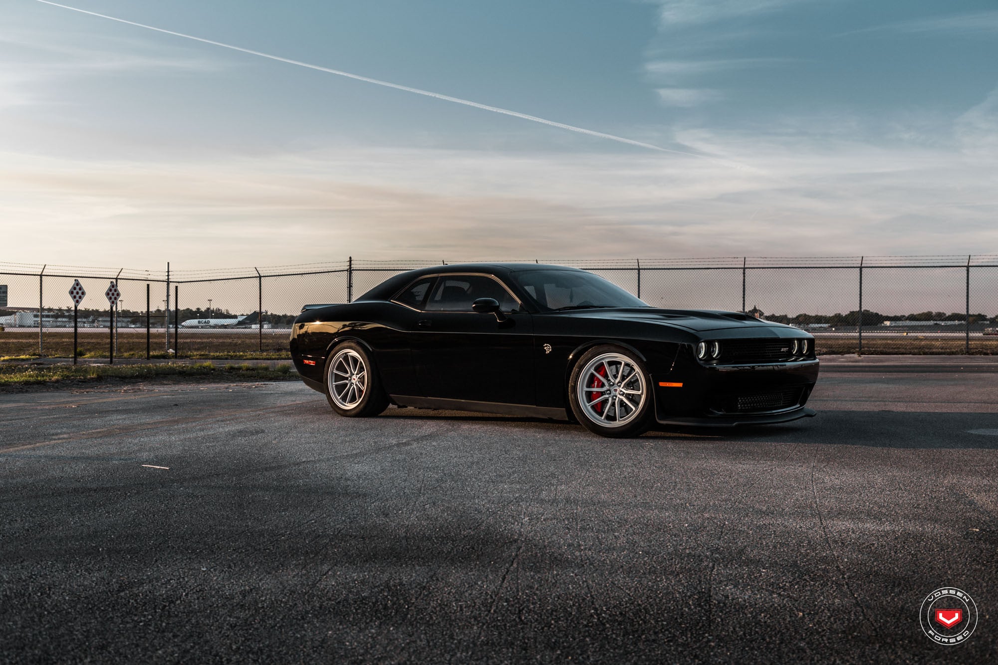 Black Dodge Challenger with Custom Side Skirts - Photo by Vossen