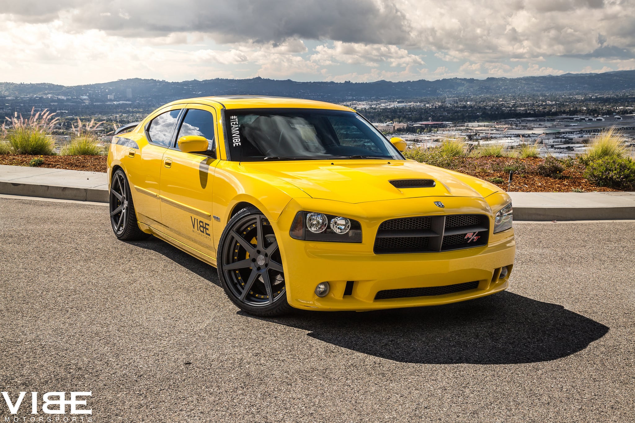Stanced Dodge Charger in Yellow Color - Photo by Vibe Motorsports