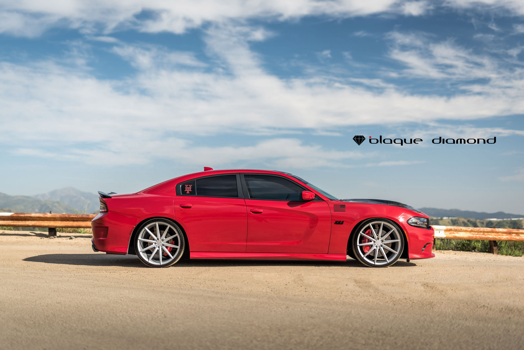 Red Dodge Charger With Black Tinted Windows - Photo by Black Diamond