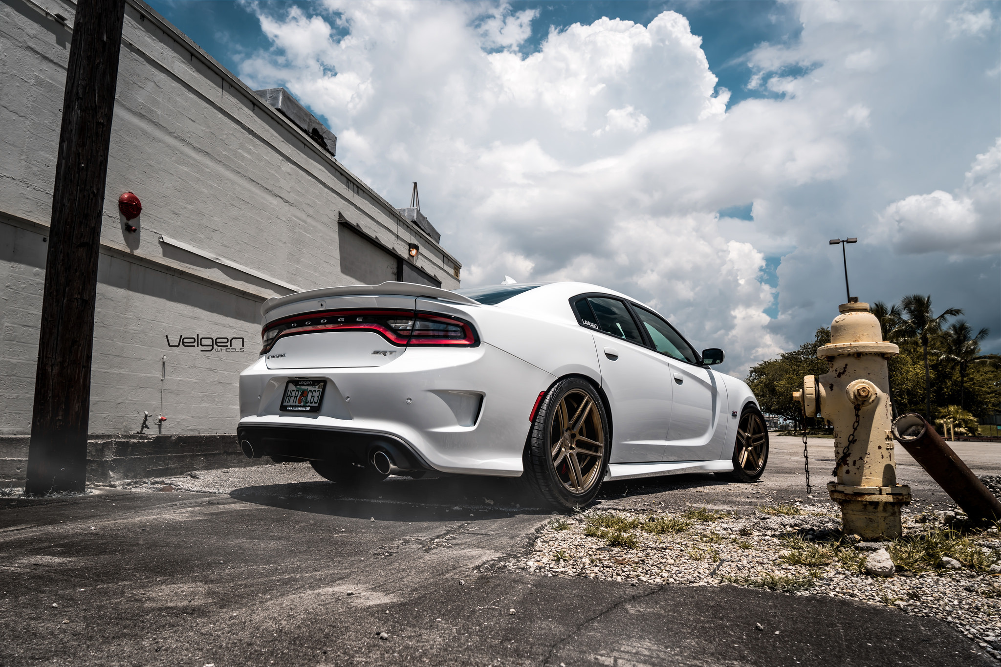 White Dodge Charger SRT with Custom Style Rear Spoiler - Photo by Velgen