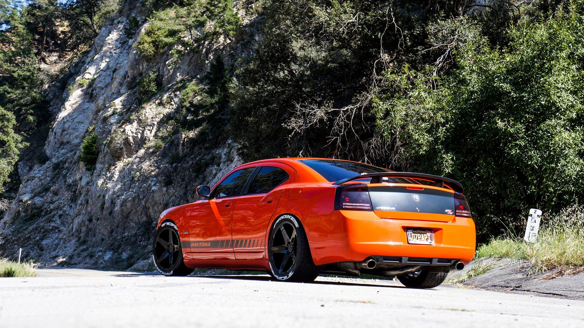 Bright Orange Dodge Charger with Contrasting Black Accents | CARiD.com  Gallery, image size:2048x1151
