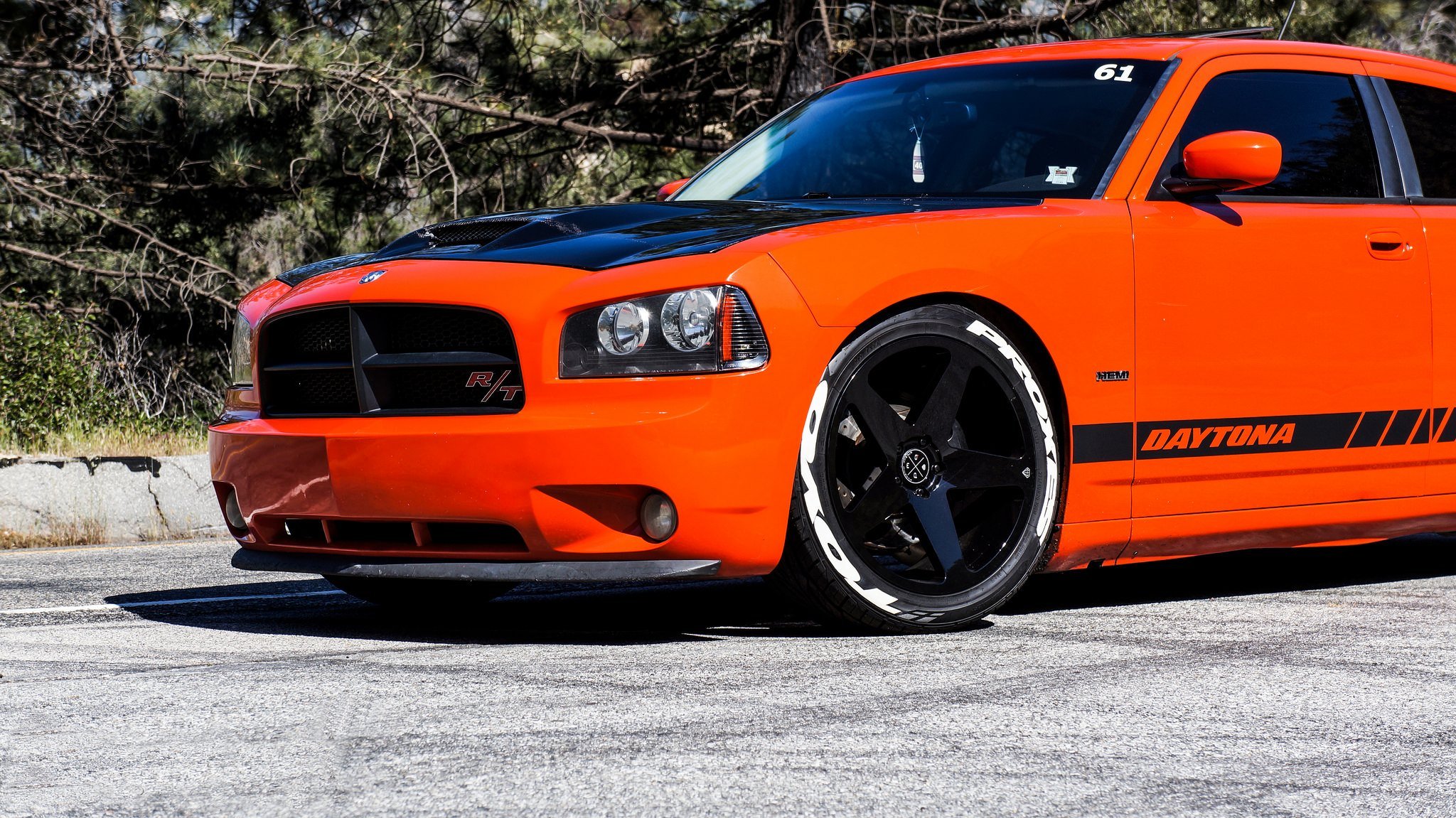Bright Orange Dodge Charger with Contrasting Black Accents | CARiD.com  Gallery, image size:2048x1151