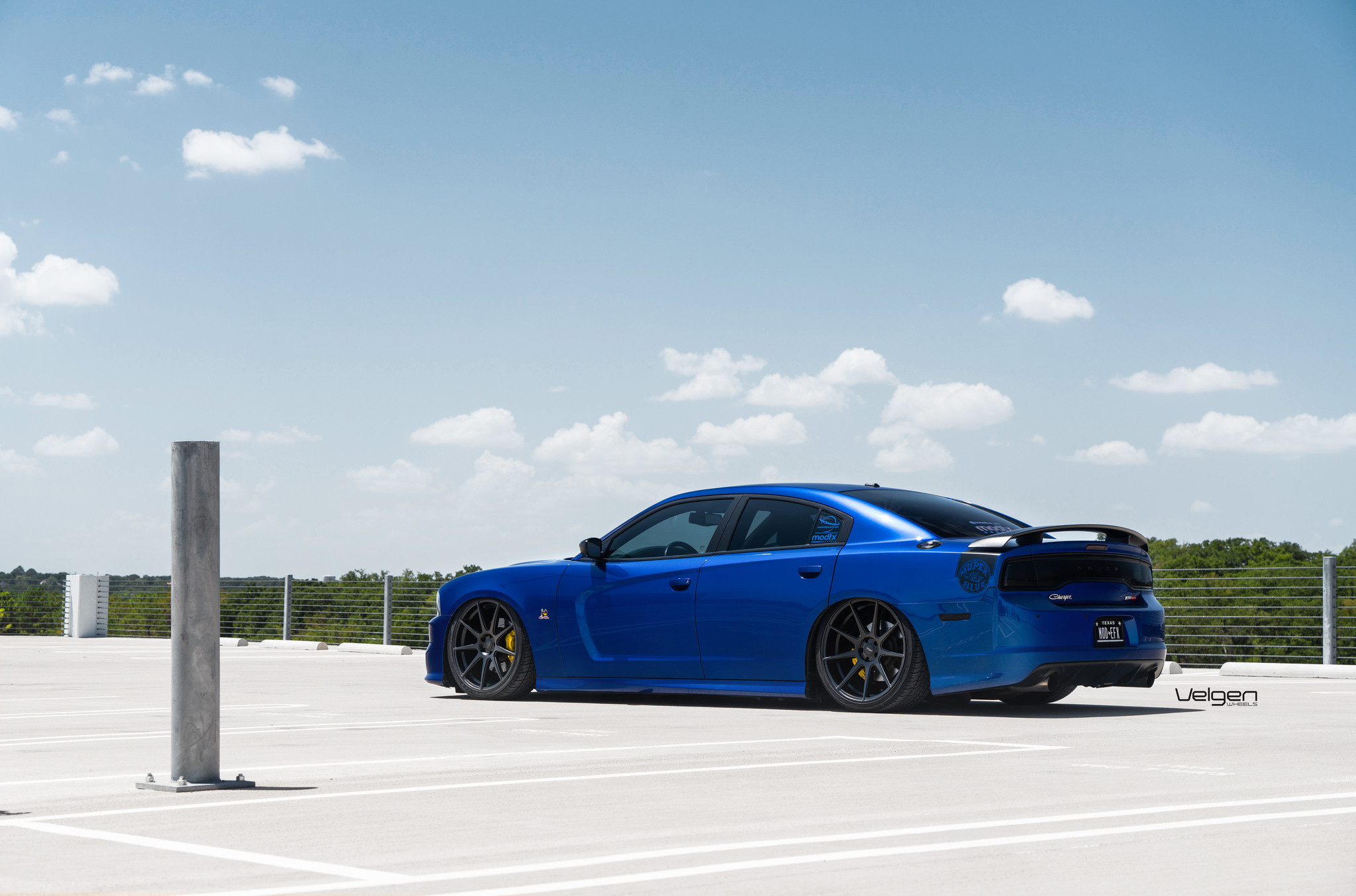 Custom Side Skirts on Blue Dodge Charger - Photo by Velgen