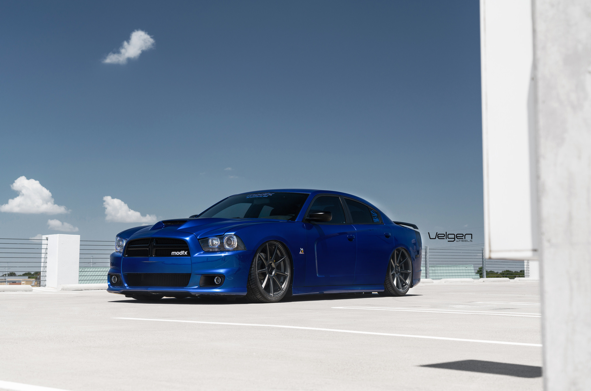 Blue Dodge Charger with Aftermarket LED Headlights - Photo by Velgen