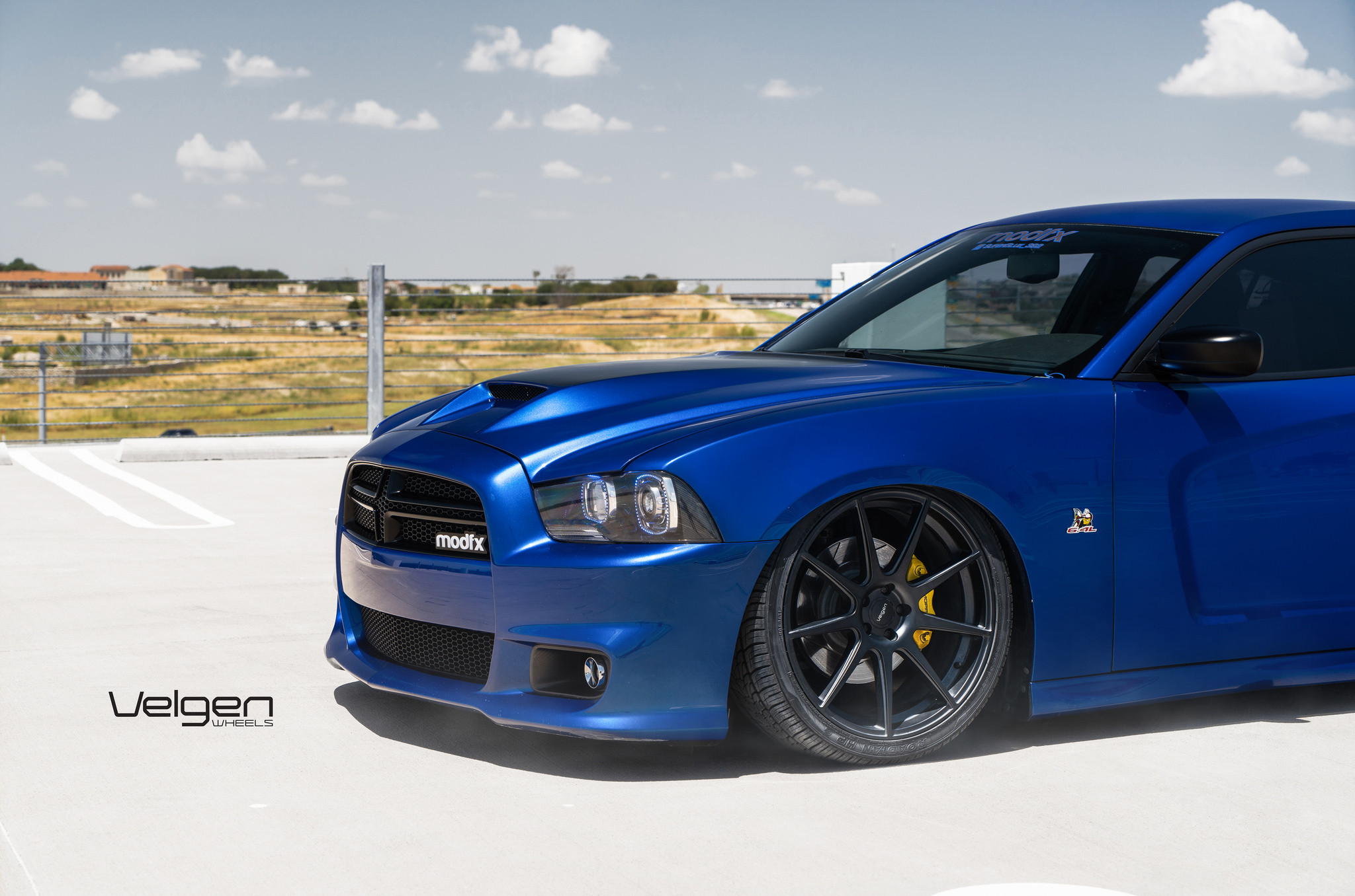 Custom Blue Dodge Charger on Nexen Roadian Tires - Photo by Velgen