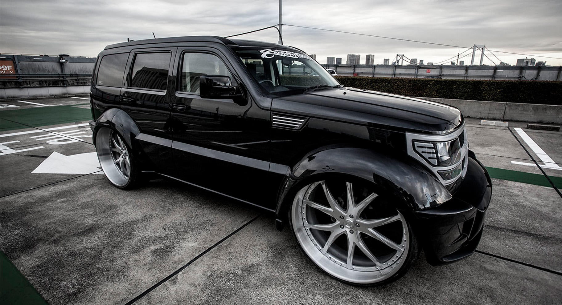 Custom Black Front Bumper on Dodge Nitro - Photo by Lexani