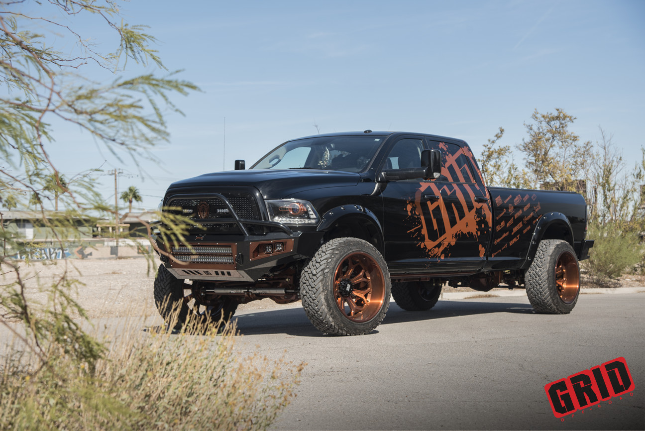 Dodge Ram Custom Prerunner Style Off-road Bumper With a Hoop - Photo by Grid Off-road