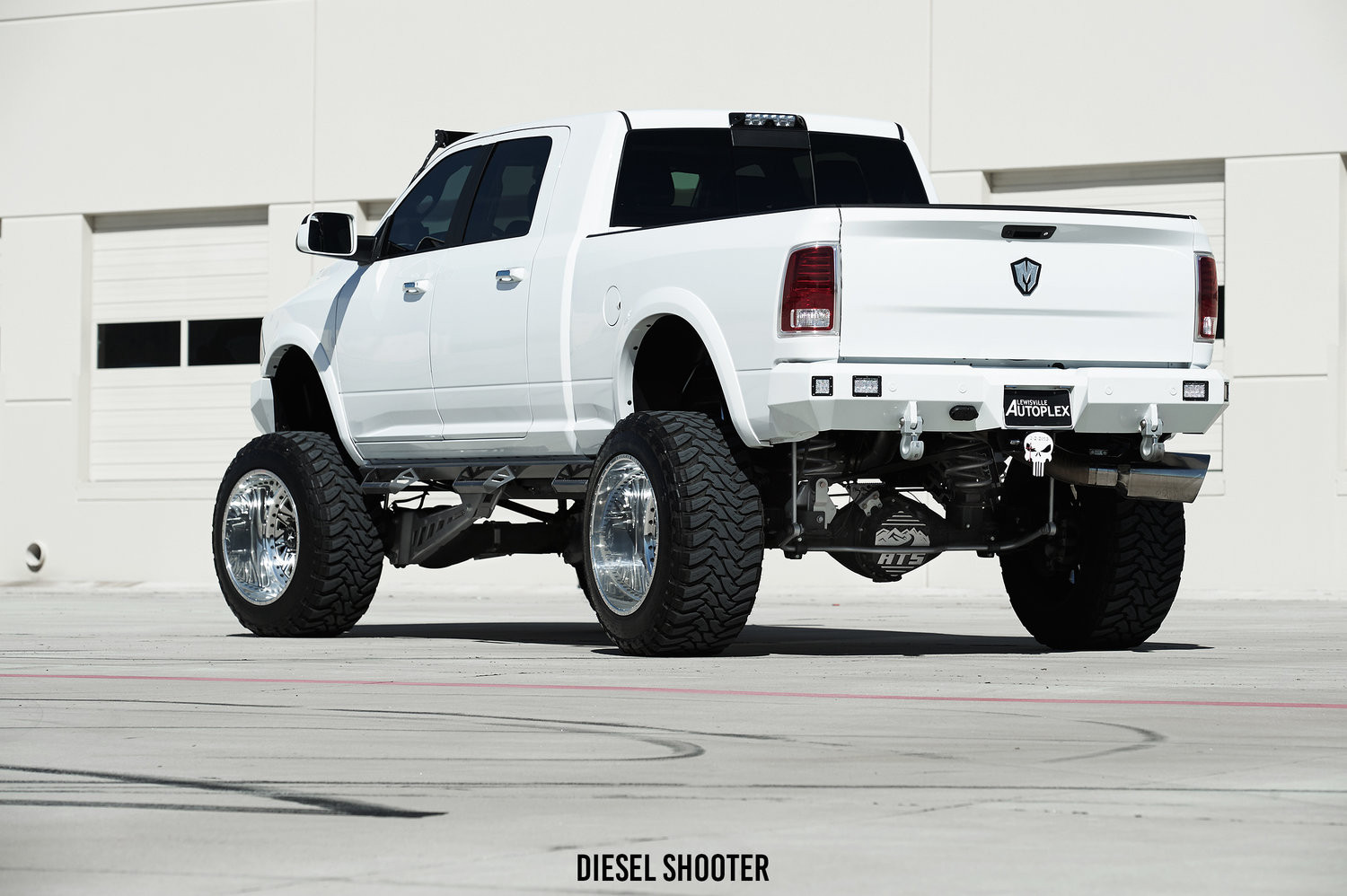 10 Inch Custom Lift Kit on White Dodge Ram - Photo by Diesel Shooter