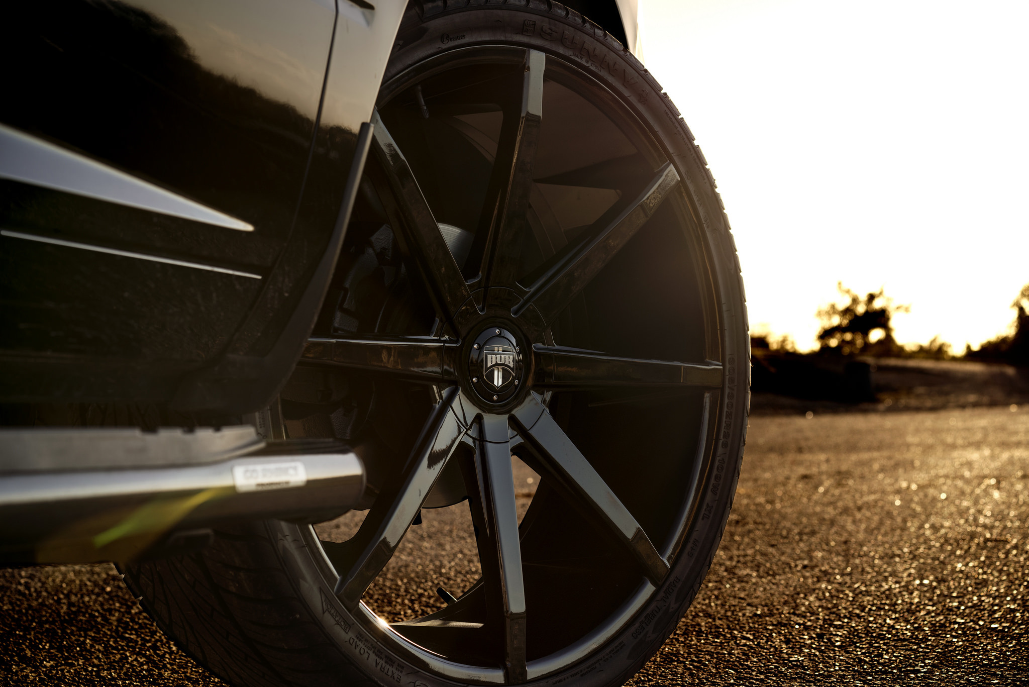 26 Inch Gloss Black DUB Rims on Dodge Ram - Photo by DUB