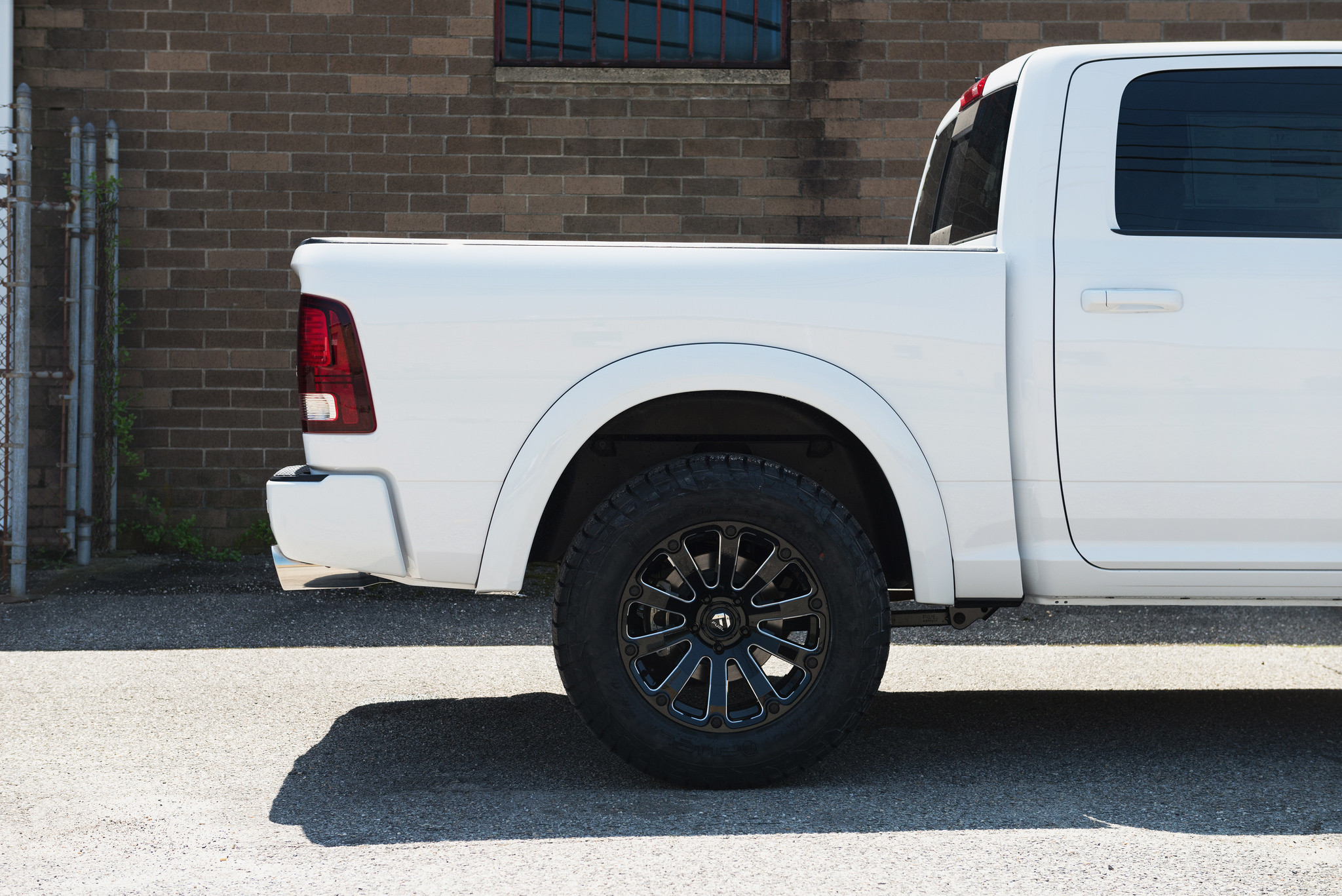 White Lifted Dodge Ram 1500 with Fuel Offroad Rims - Photo by Fuel Offroad