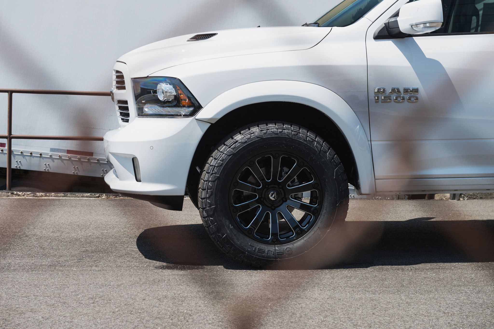 Fuel Offroad Gripper Tires on White Dodge Ram - Photo by Fuel Offroad